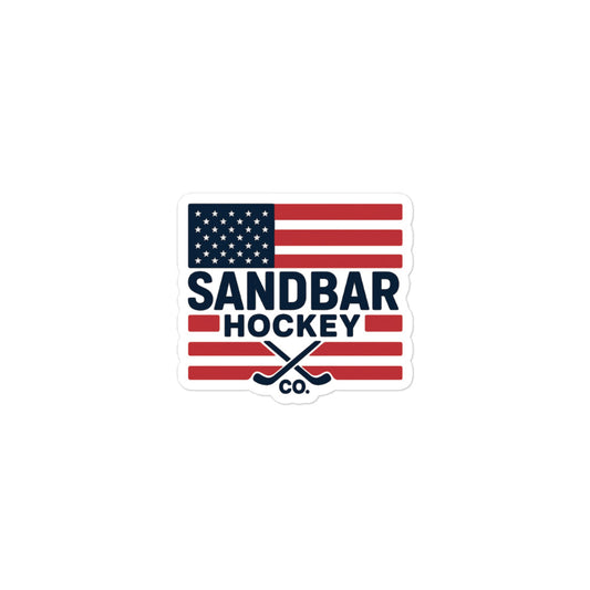 Small Hockey sticker featuring a USA flag design with Sandbar Hockey Co. text and crossed hockey sticks