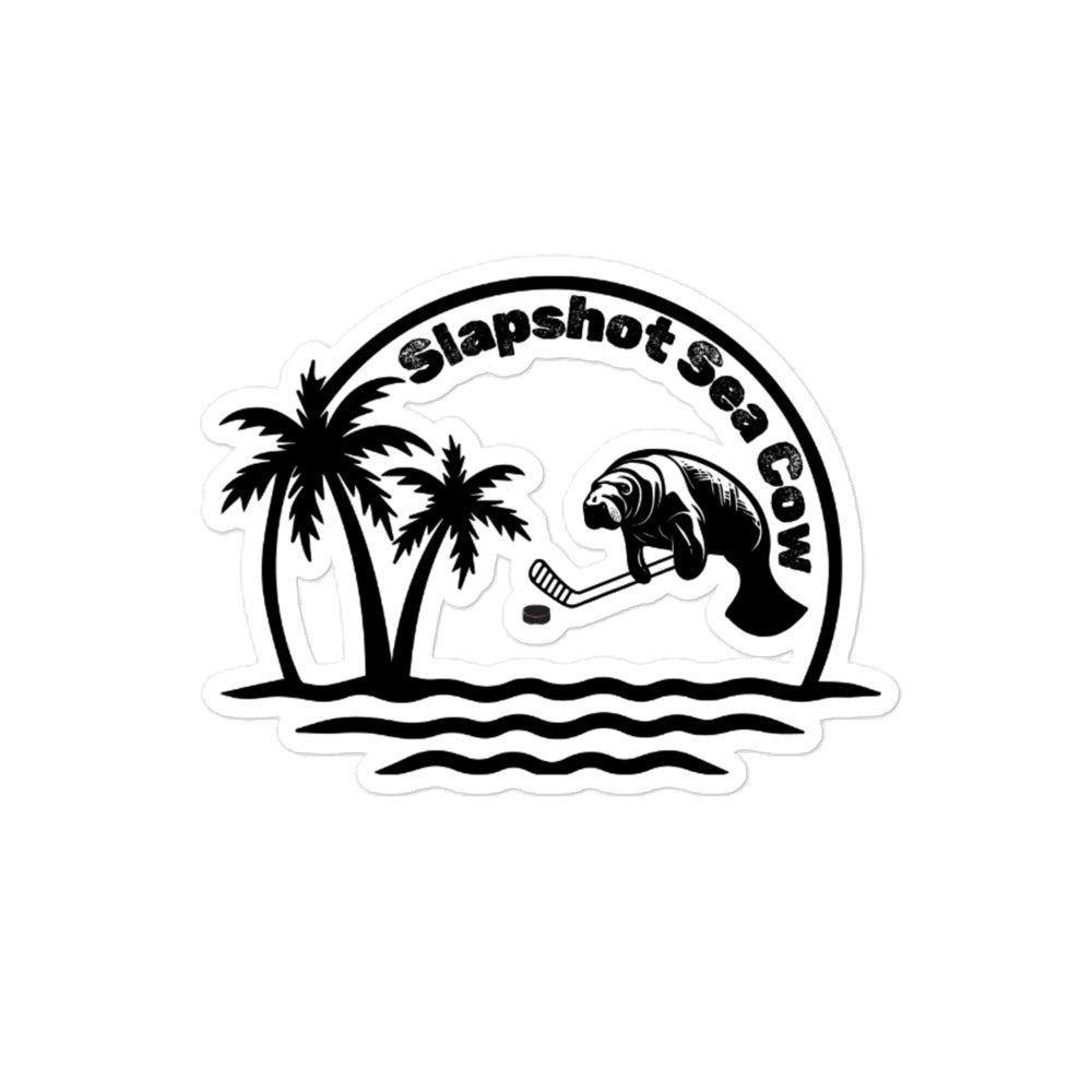 Medium Slapshot Sea Cow sticker with a sea cow holding a hockey stick, palm trees, ocean waves, and curved Slapshot Sea Cow text.