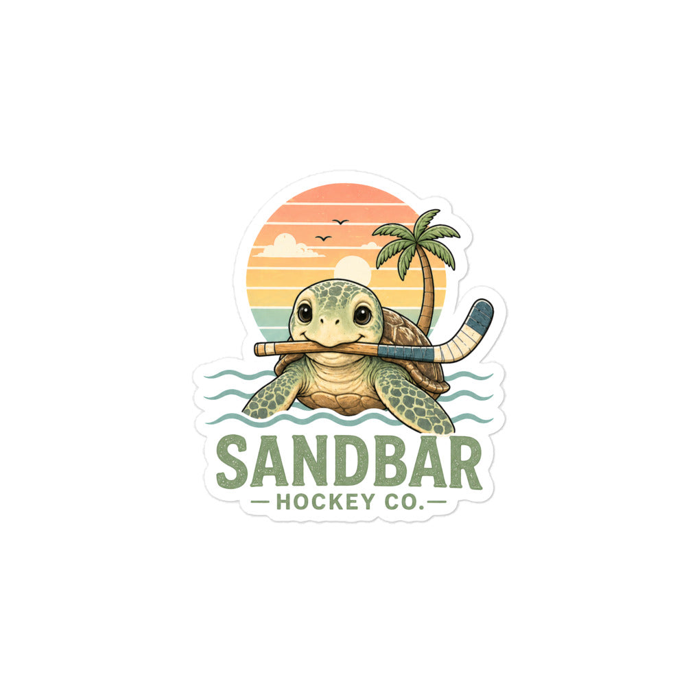 Medium Sea turtle hockey sticker featuring a cute turtle holding a hockey stick in front of a retro beach sunset, ocean waves, palm tree, and Sandbar Hockey Co. lettering.