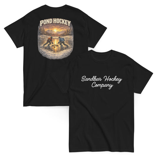 Black short-sleeve T-shirt mockup showing front and back views. The back features a vintage-style pond hockey graphic with two players on a frozen pond at sunset, pine trees, mountains, and the words “POND HOCKEY” above. The front has “Sandbar Hockey Company” in white script across the chest.