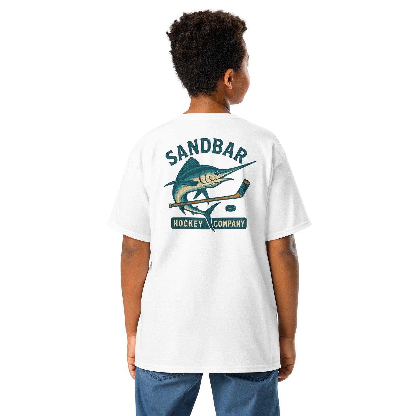 White youth hockey t-shirt back side on model with marlin and hockey stick graphic and Sandbar Hockey Company text