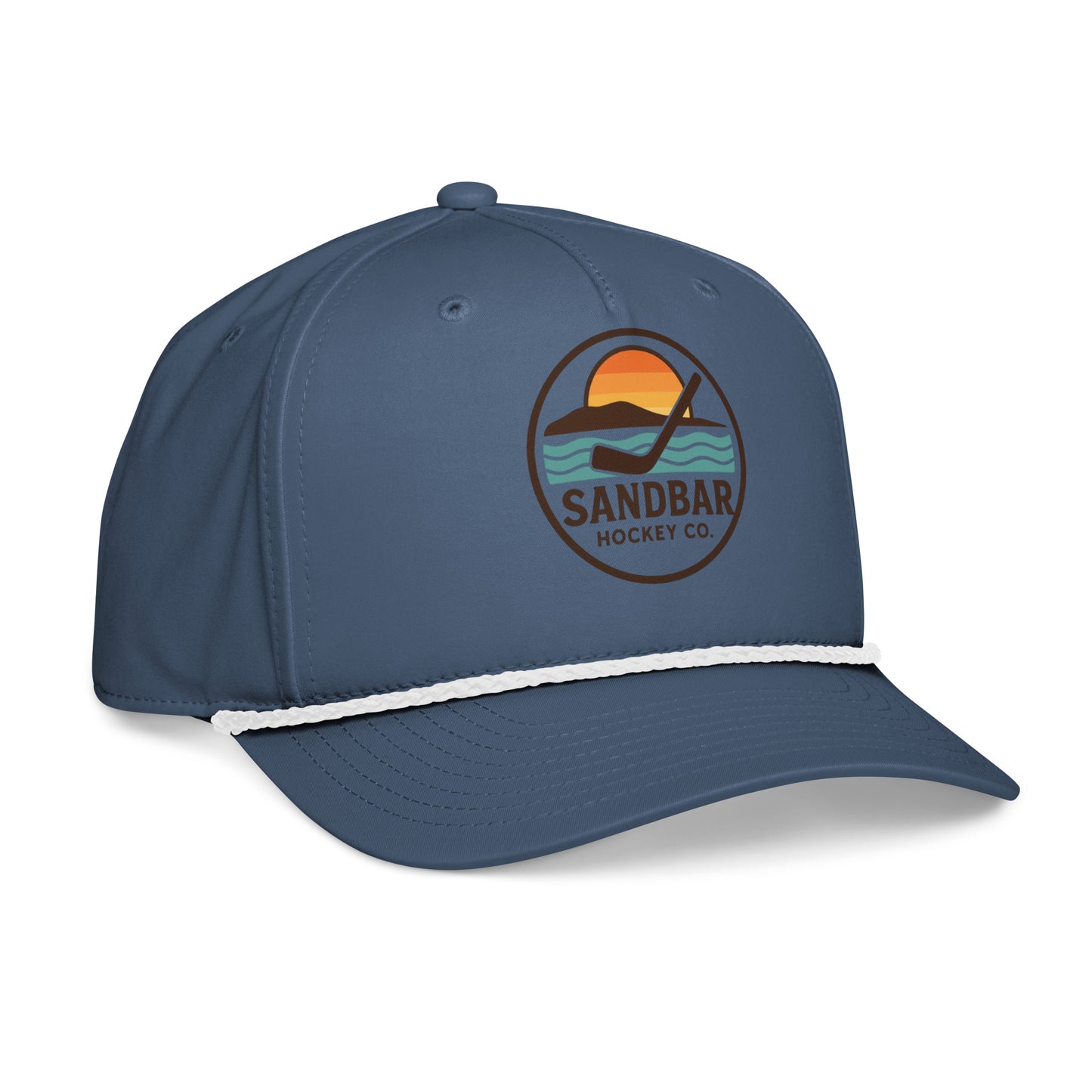 Blue hockey rope hat left front angle view with Sandbar Hockey Co. sunset puck logo and white rope detail.