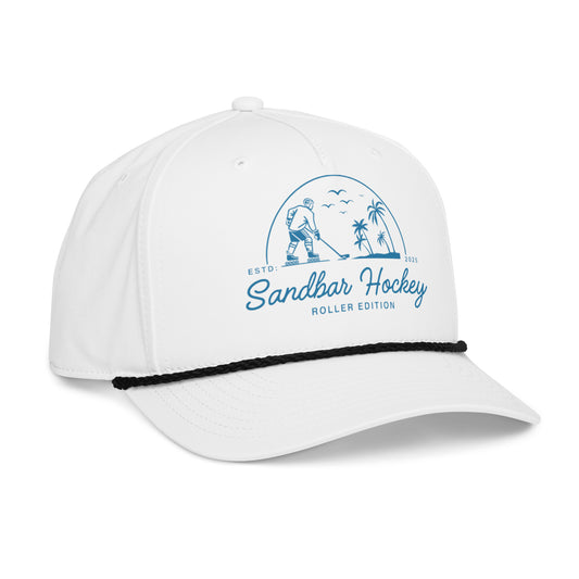 White roller hockey rope hat left front angle view with blue Sandbar Hockey Roller Edition logo, black rope detail, and curved brim.