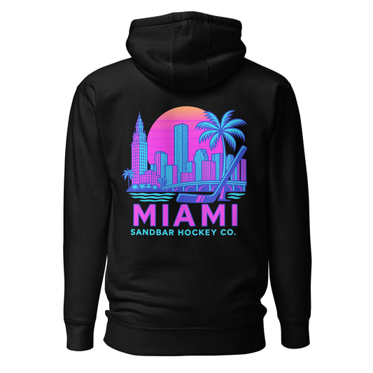 Black Miami Sandbar Hockey hoodie back view with large neon Miami skyline graphic, palm trees, hockey stick, and Miami Sandbar Hockey Co. text