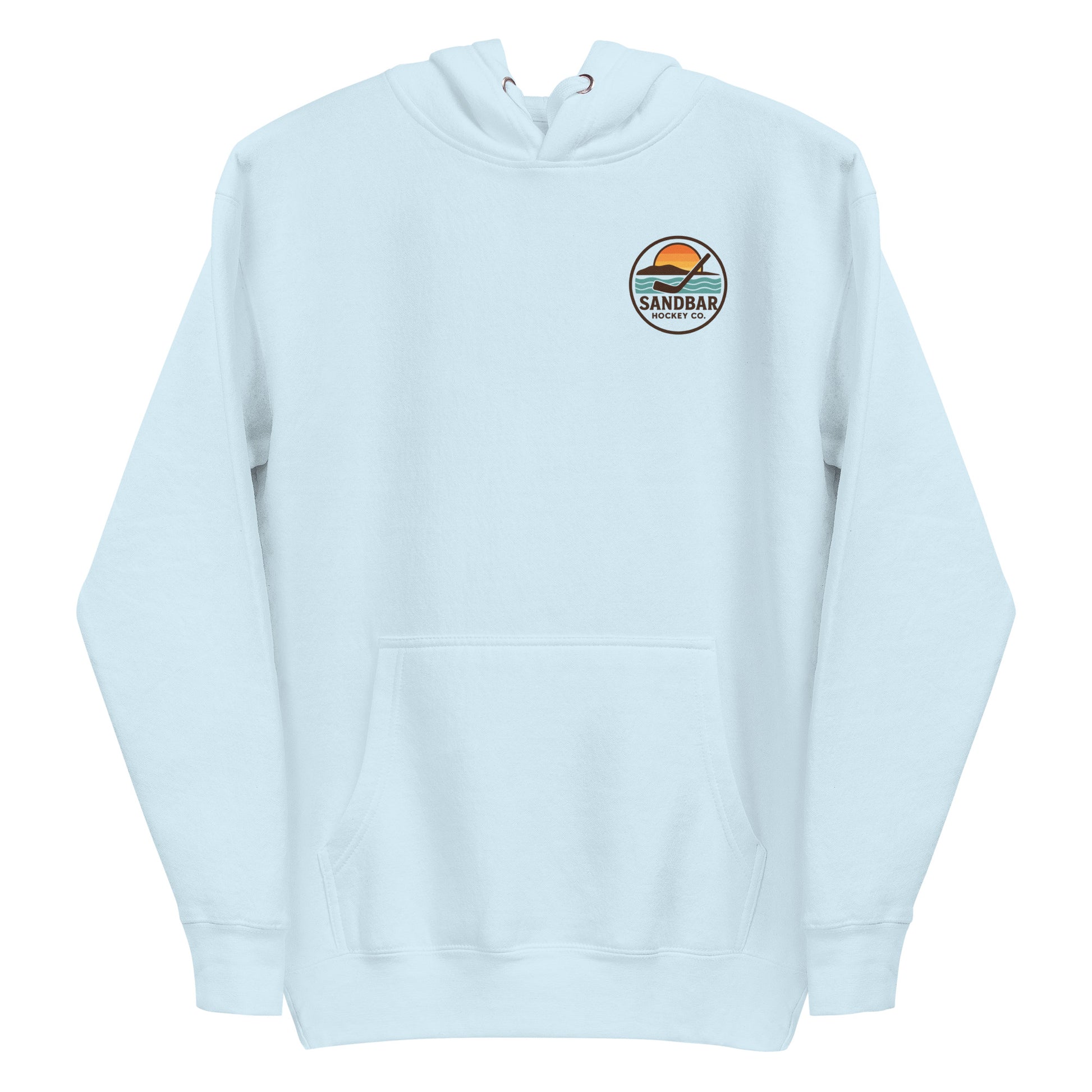 Light blue hockey hoodie front side with small circular Sandbar Hockey Co. chest logo featuring sunset, water, and hockey stick
