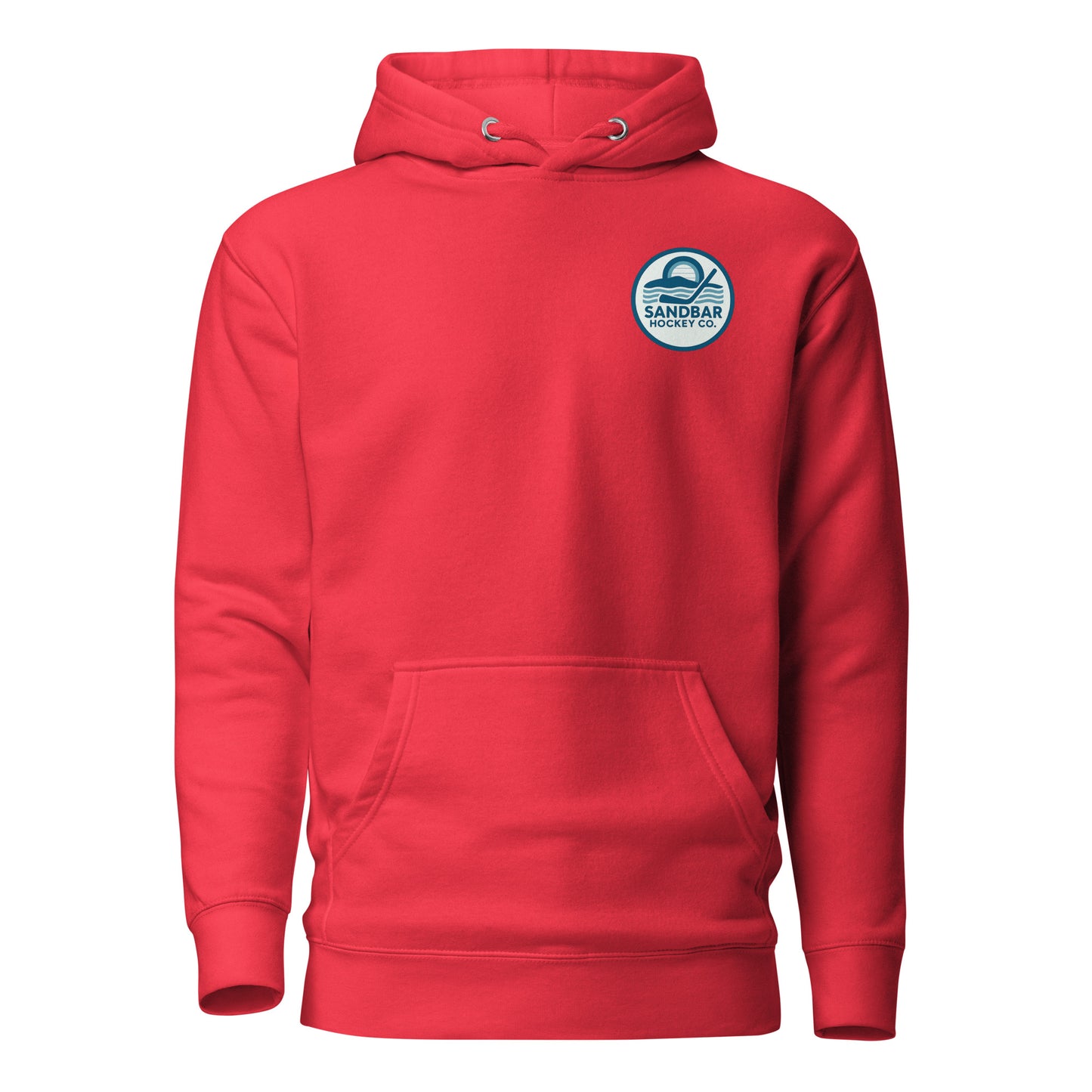 Red hockey hoodie front side with small circular Sandbar Hockey Co. chest logo featuring sunset, water, and hockey stick