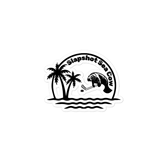 Small Slapshot Sea Cow sticker with a sea cow holding a hockey stick, palm trees, ocean waves, and curved Slapshot Sea Cow text.