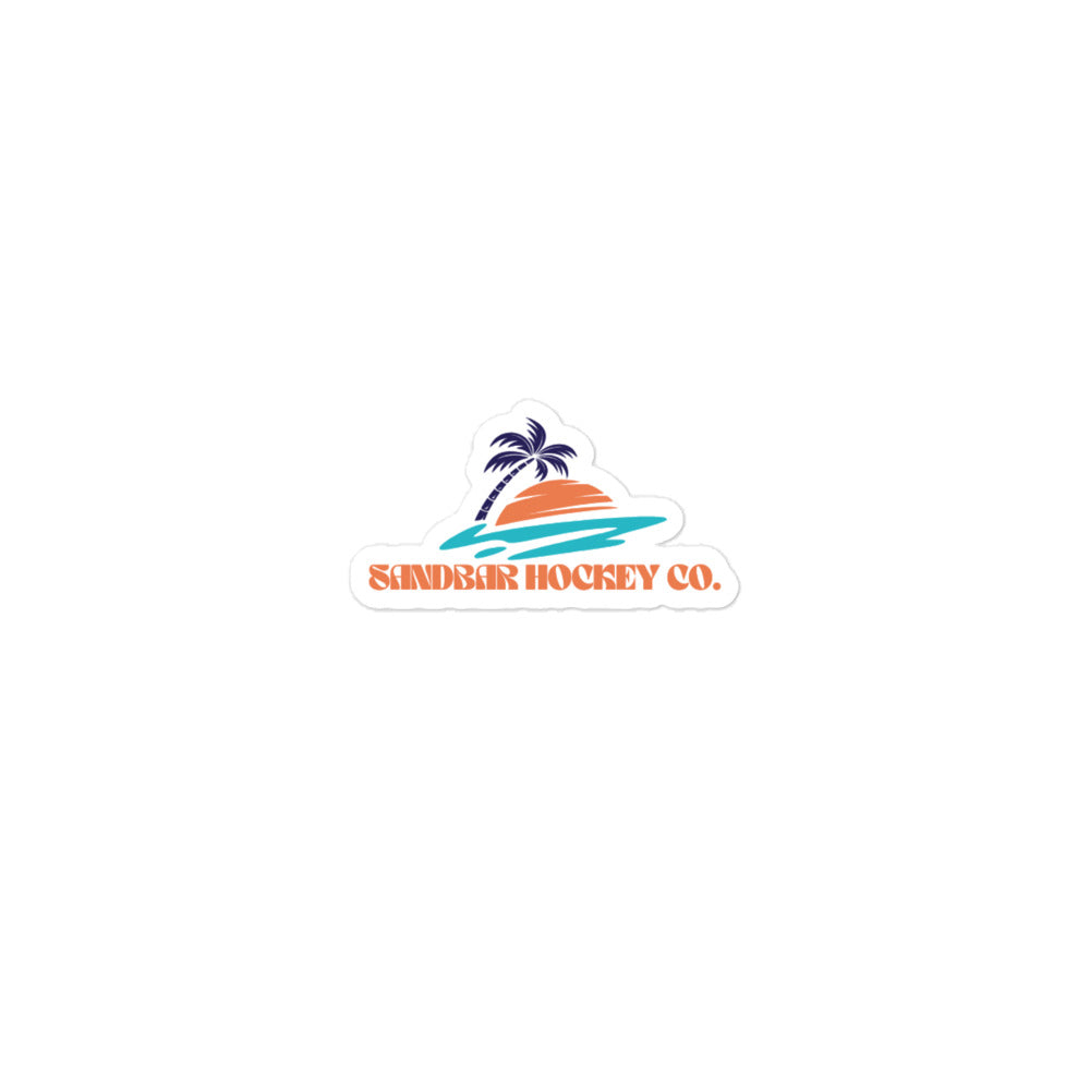 Small Sandbar Hockey Co. sticker with a palm tree, sunset, teal ocean waves, and orange retro-style logo text.