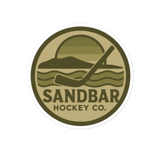 Large Sandbar Hockey Co. camo circular logo sticker featuring a coastal hockey scene with a sunset, shoreline, waves, and hockey stick.