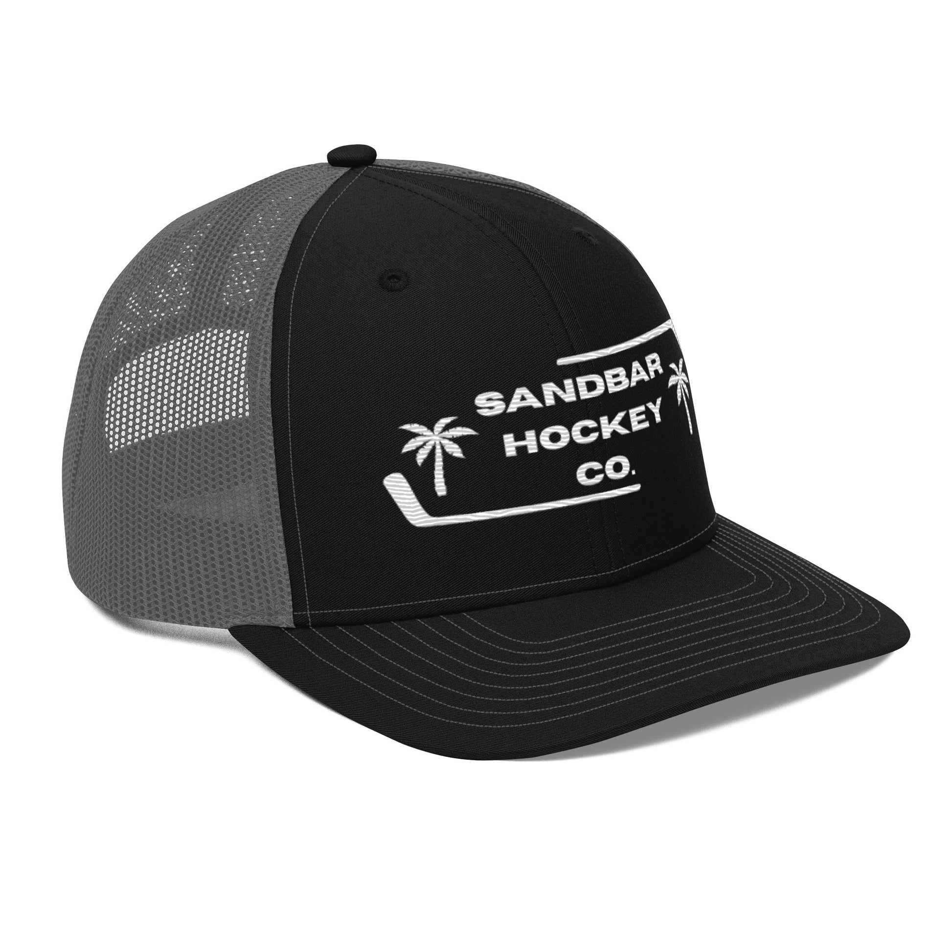 Black and charcoal gray hockey snapback hat right front angle view with white Sandbar Hockey Co. logo.