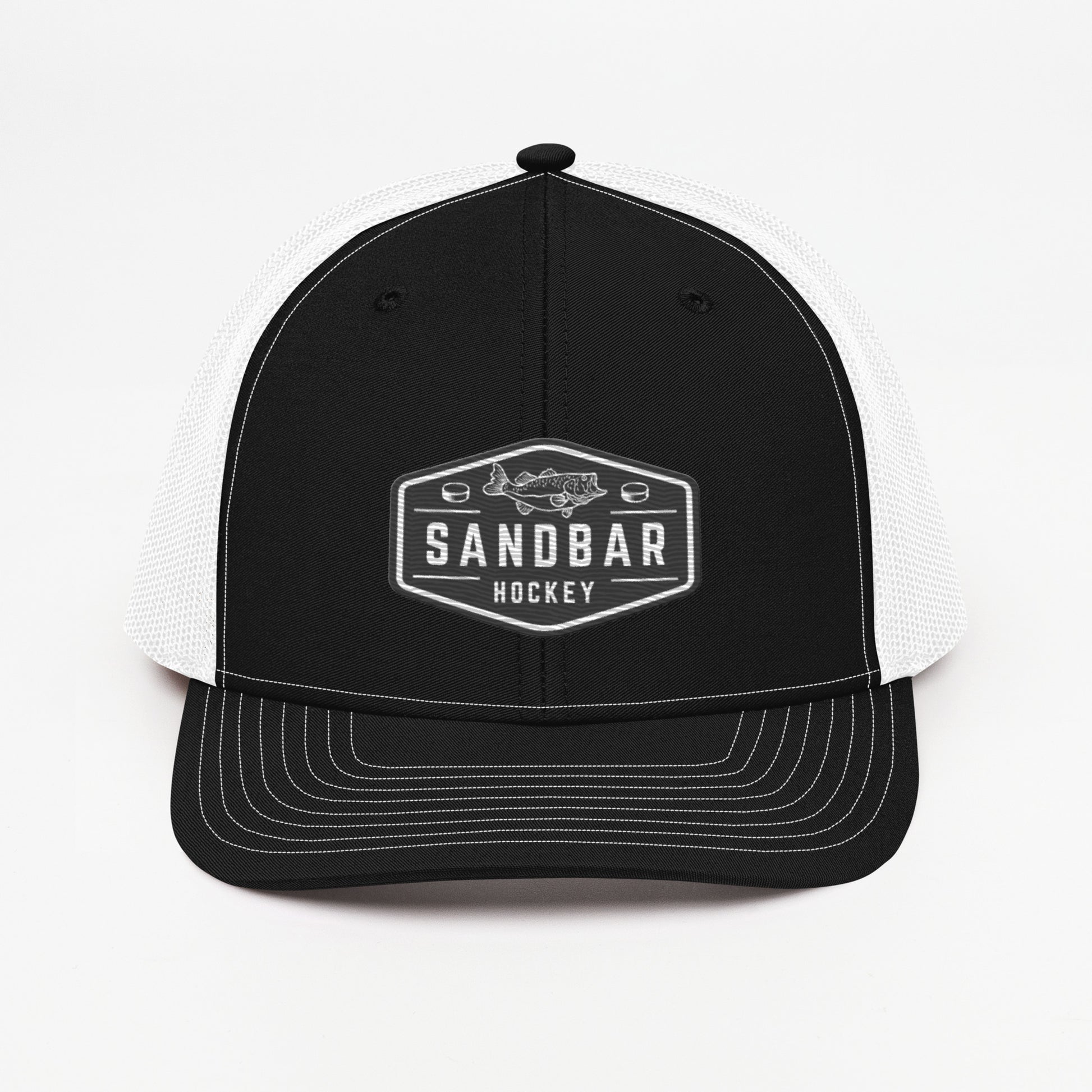 Black Sandbar Hockey snapback hat front angle view with black rectangular badge logo featuring a fish