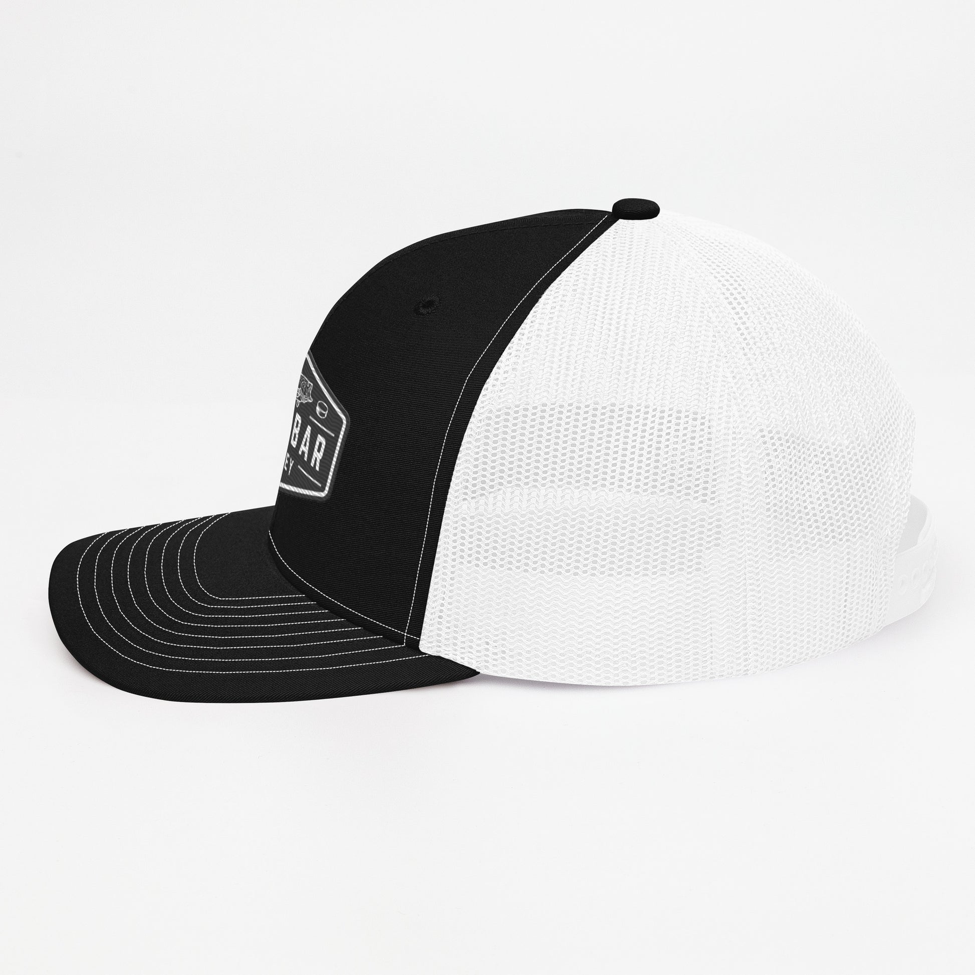 Black and white Sandbar Hockey snapback hat right side profile view with curved brim and mesh back