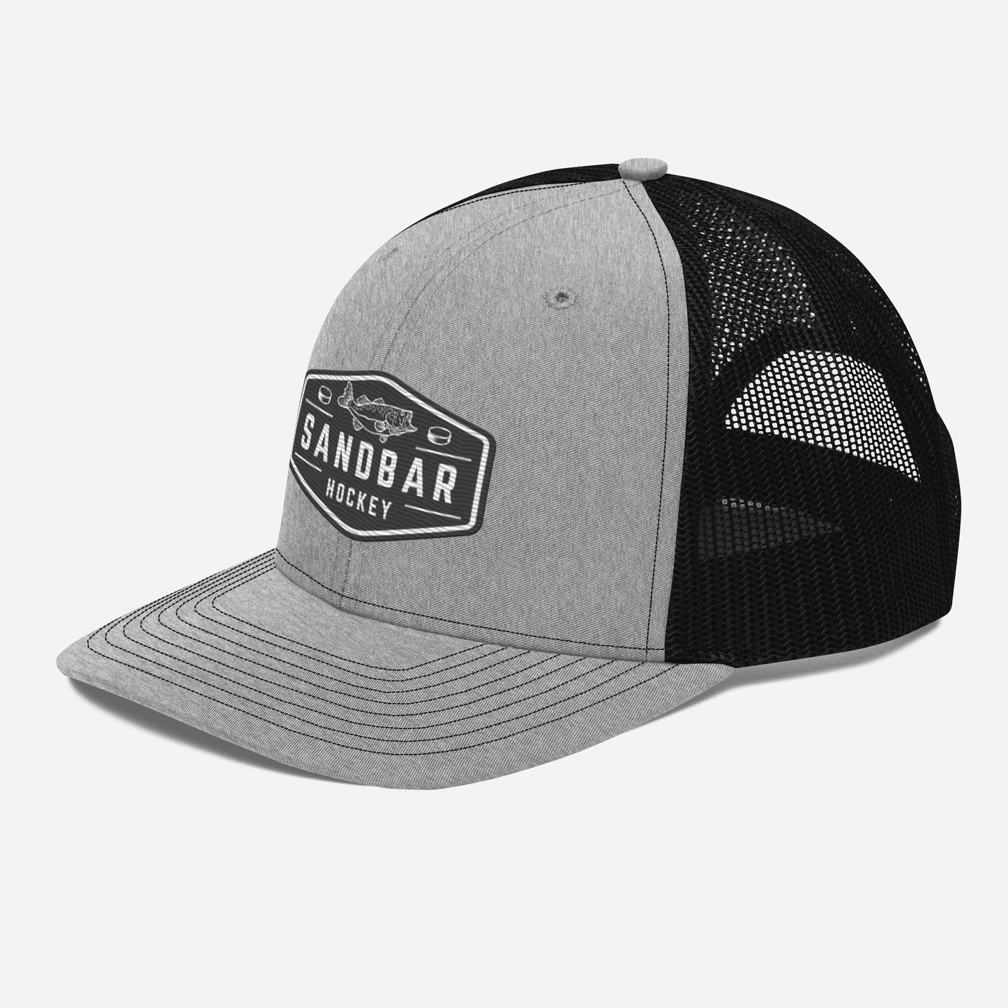 Light grey and black Sandbar Hockey snapback hat left side angle view with black mesh back and rectangular badge logo featuring a fish