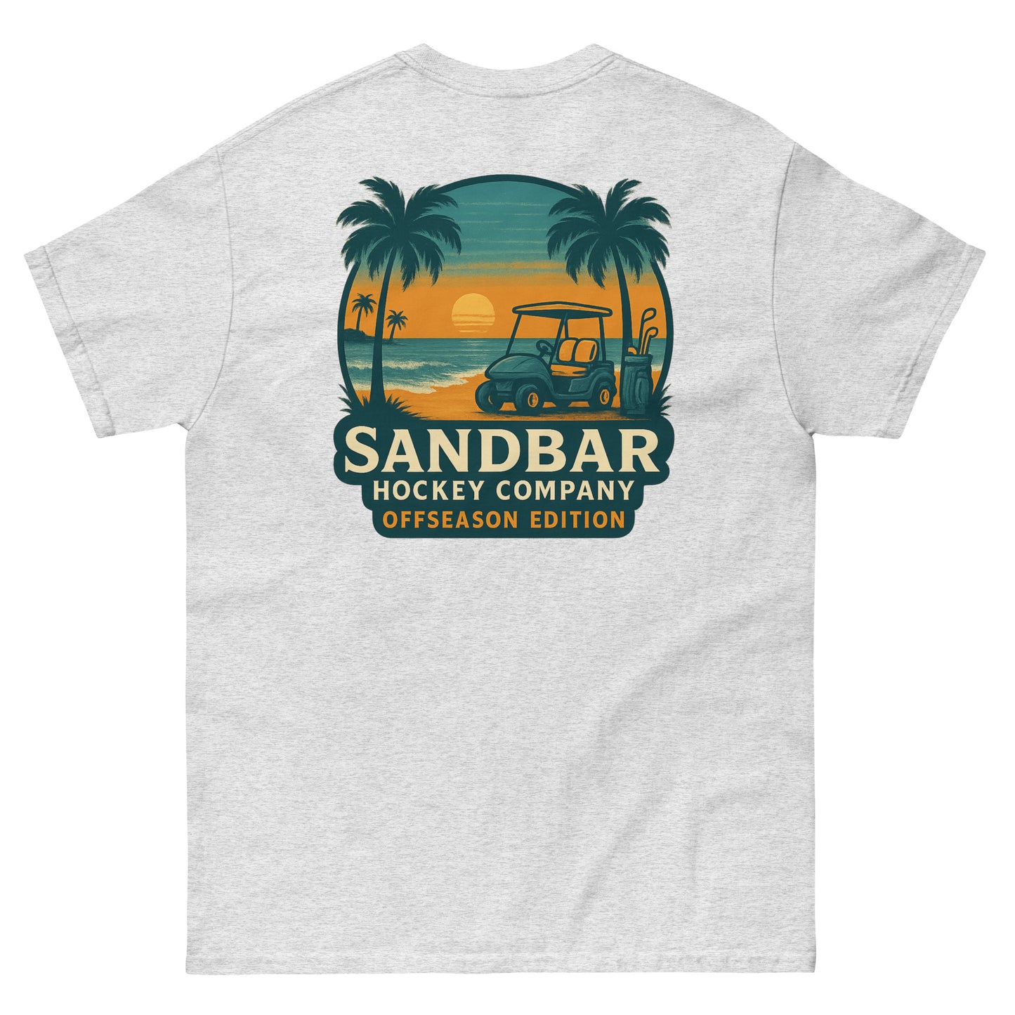 Ash T-shirt with a large back graphic of a beach sunset scene featuring palm trees, ocean waves, a golf cart, hockey sticks, and the text “Sandbar Hockey Company Offseason Edition.”