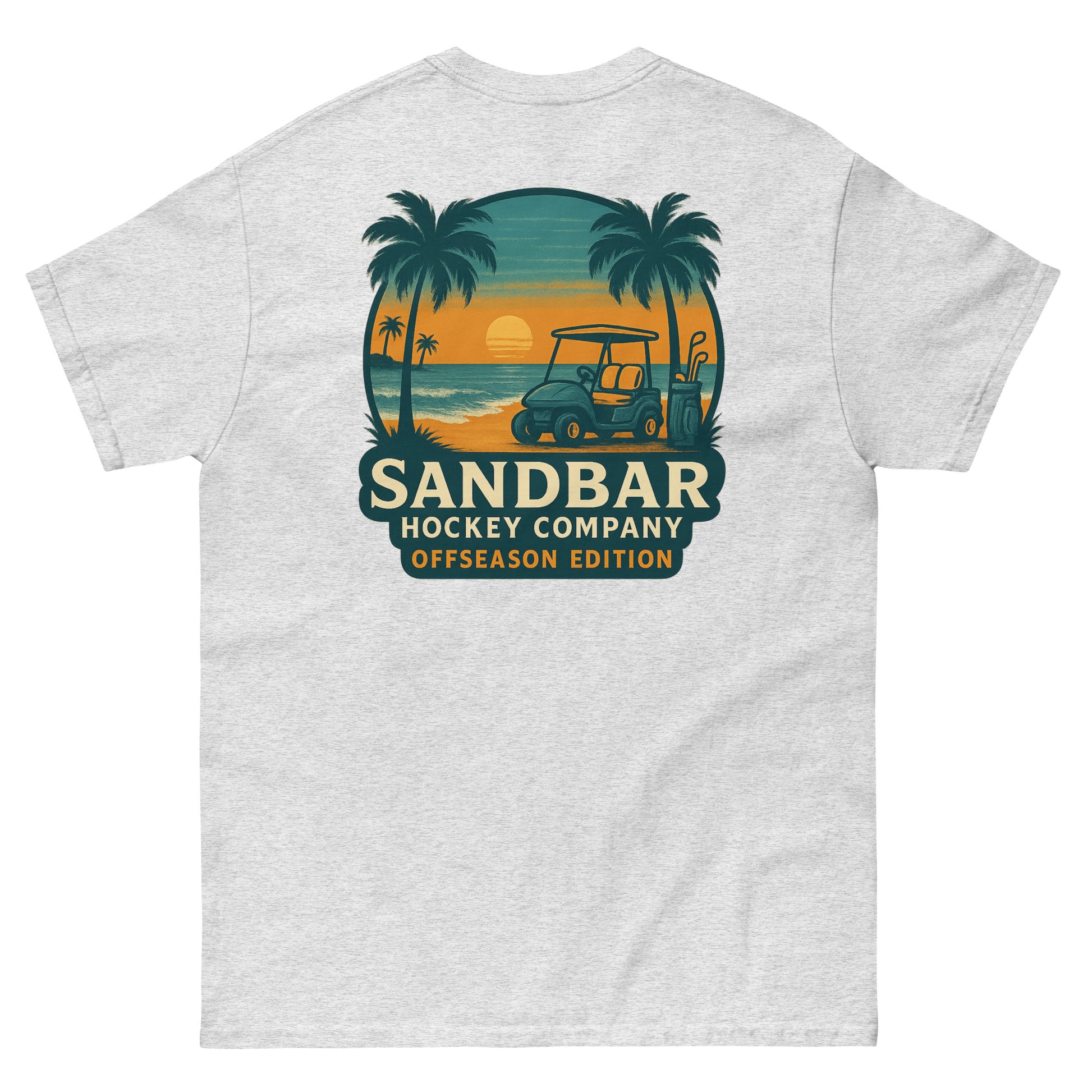 Ash T-shirt with a large back graphic of a beach sunset scene featuring palm trees, ocean waves, a golf cart, hockey sticks, and the text “Sandbar Hockey Company Offseason Edition.”