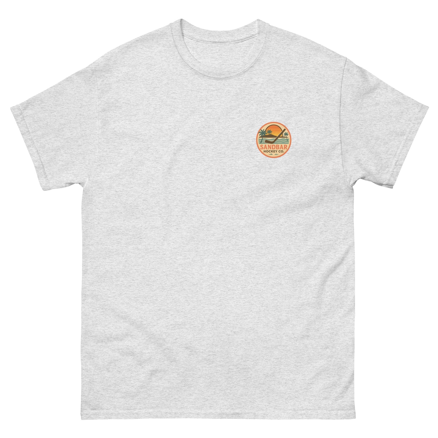 Ash hockey t-shirt front side with small circular Sandbar Hockey Co. sunset, palm tree, ocean wave, and hockey stick chest logo
