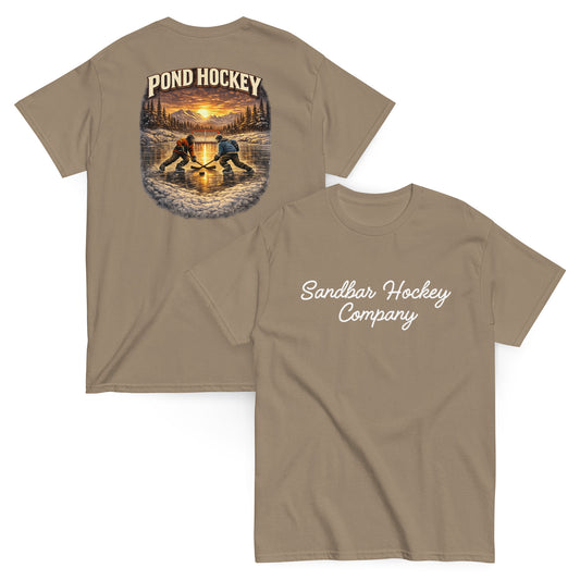 Brown short-sleeve T-shirt mockup showing front and back views. The back features a vintage-style pond hockey graphic with two players on a frozen pond at sunset, pine trees, mountains, and the words “POND HOCKEY” above. The front has “Sandbar Hockey Company” in white script across the chest.