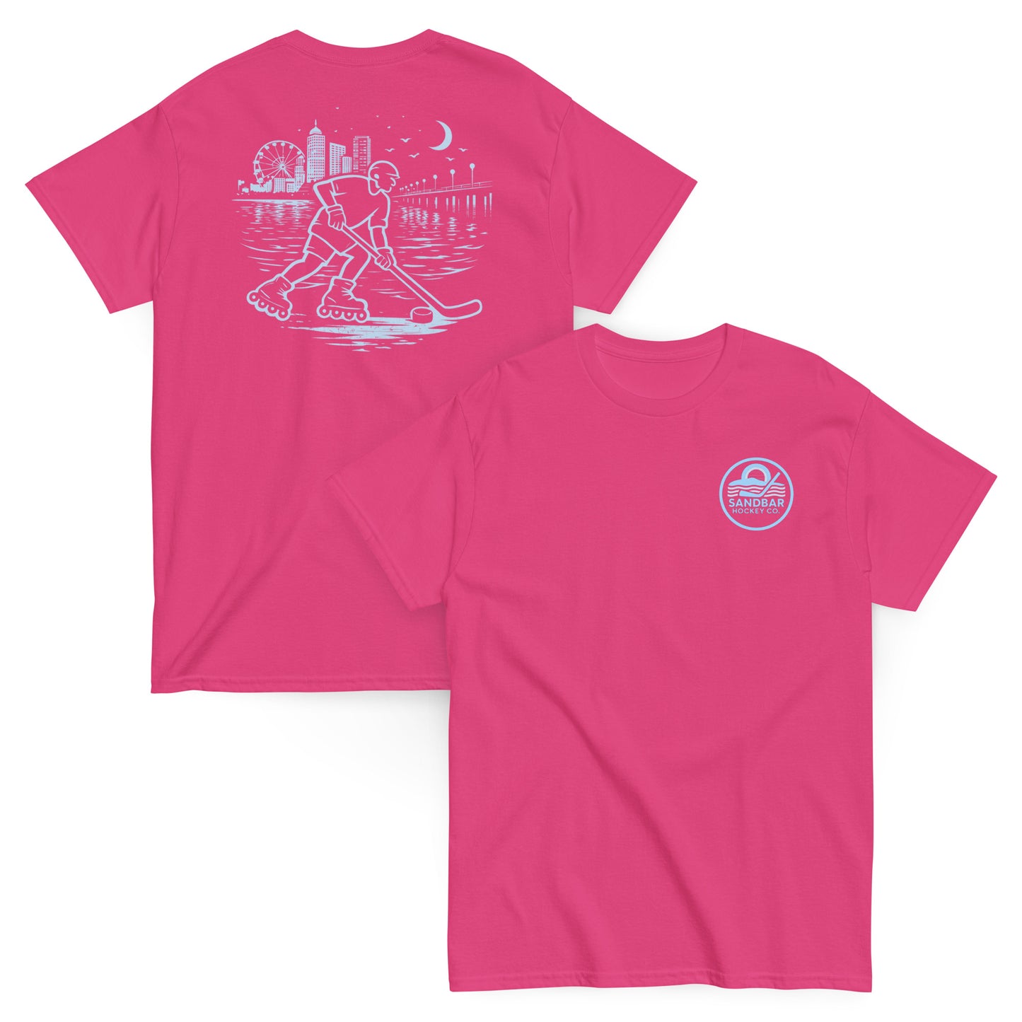 Pink roller hockey t-shirt showing back graphic with a roller hockey player skating by the water at night and blue front chest Sandbar Hockey Co. logo.