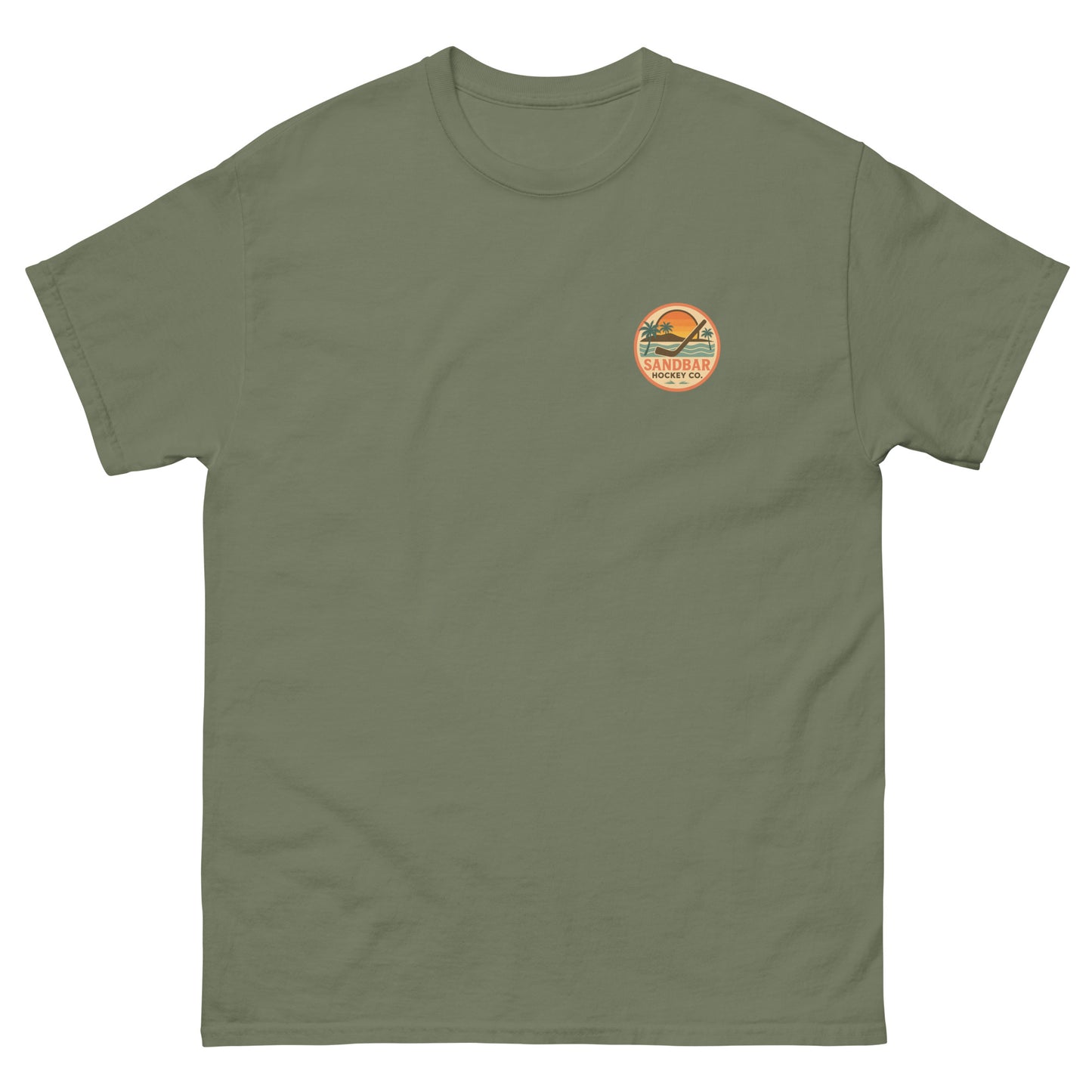 Military green hockey t-shirt front side with small circular Sandbar Hockey Co. sunset, palm tree, ocean wave, and hockey stick chest logo