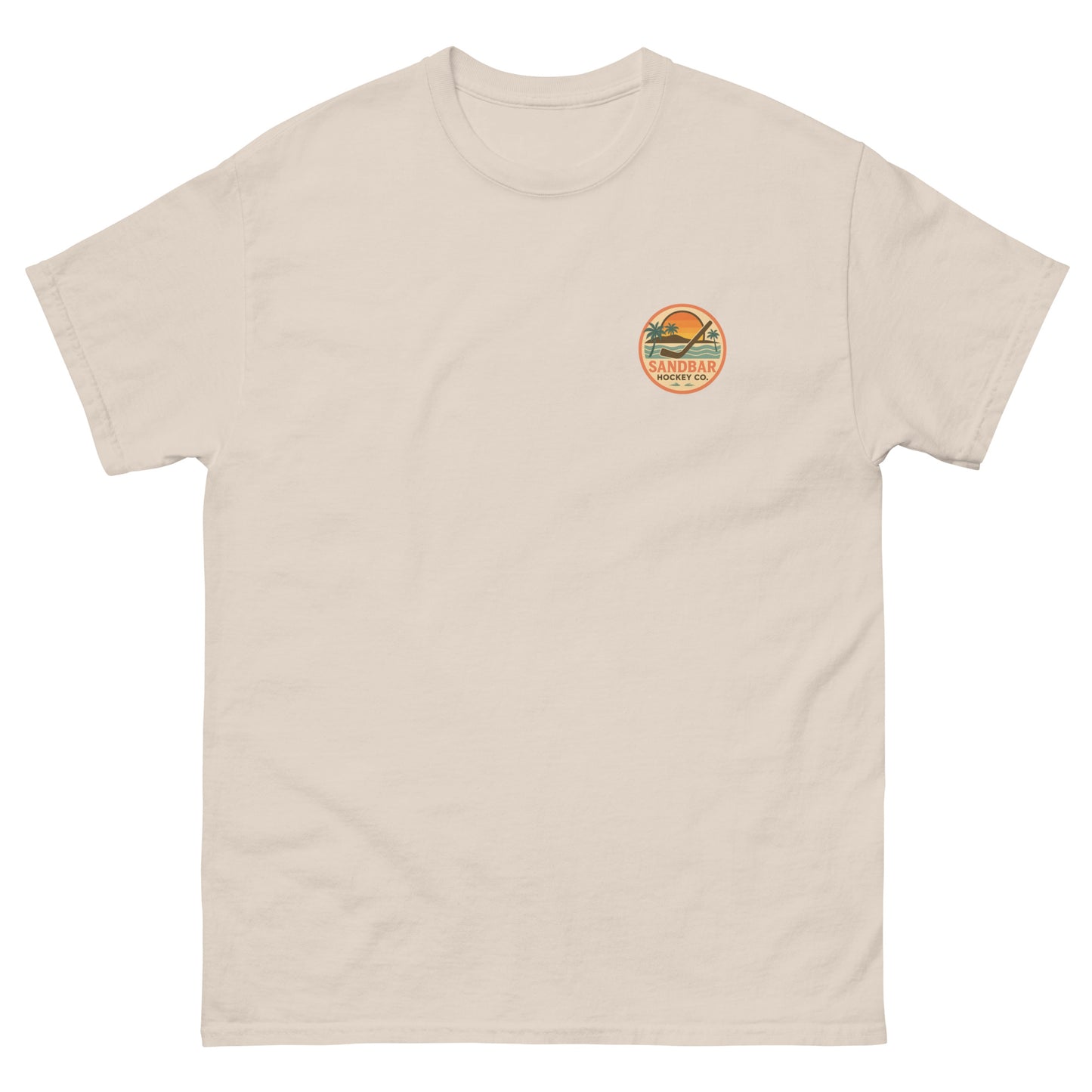 Natural hockey t-shirt front side with small circular Sandbar Hockey Co. sunset, palm tree, ocean wave, and hockey stick chest logo