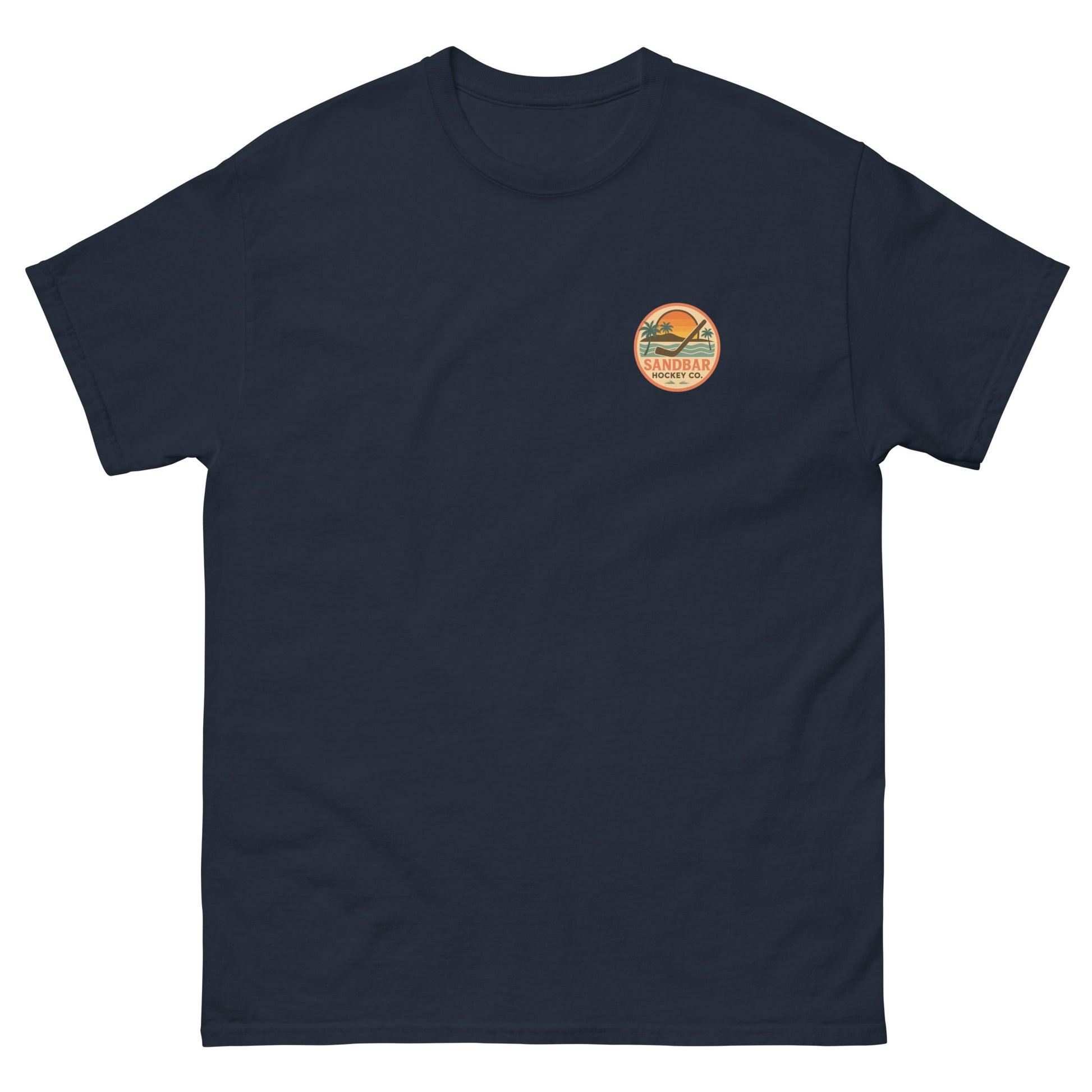 Navy hockey t-shirt front side with small circular Sandbar Hockey Co. sunset, palm tree, ocean wave, and hockey stick chest logo