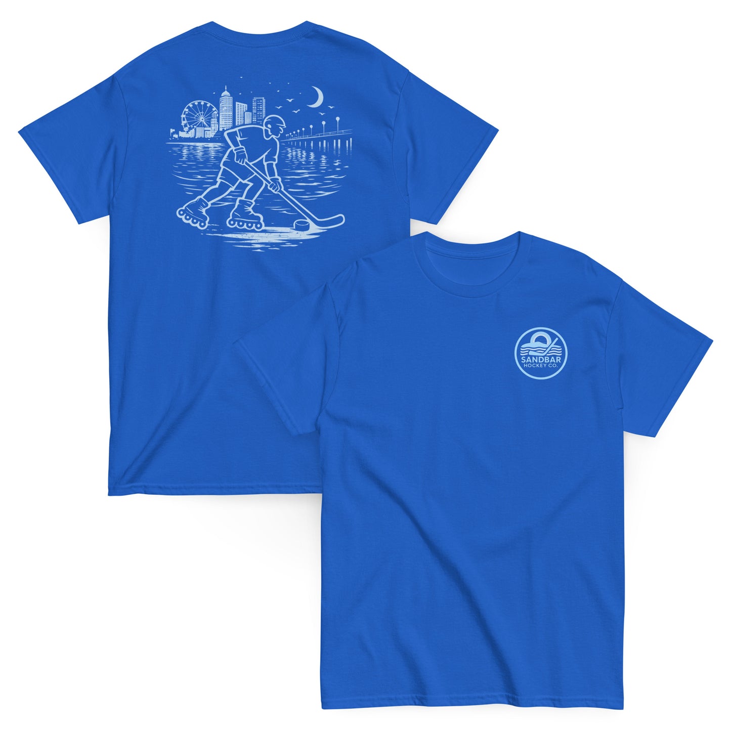 Royal blue roller hockey t-shirt showing back graphic with a roller hockey player skating by the water at night and front chest Sandbar Hockey Co. logo.