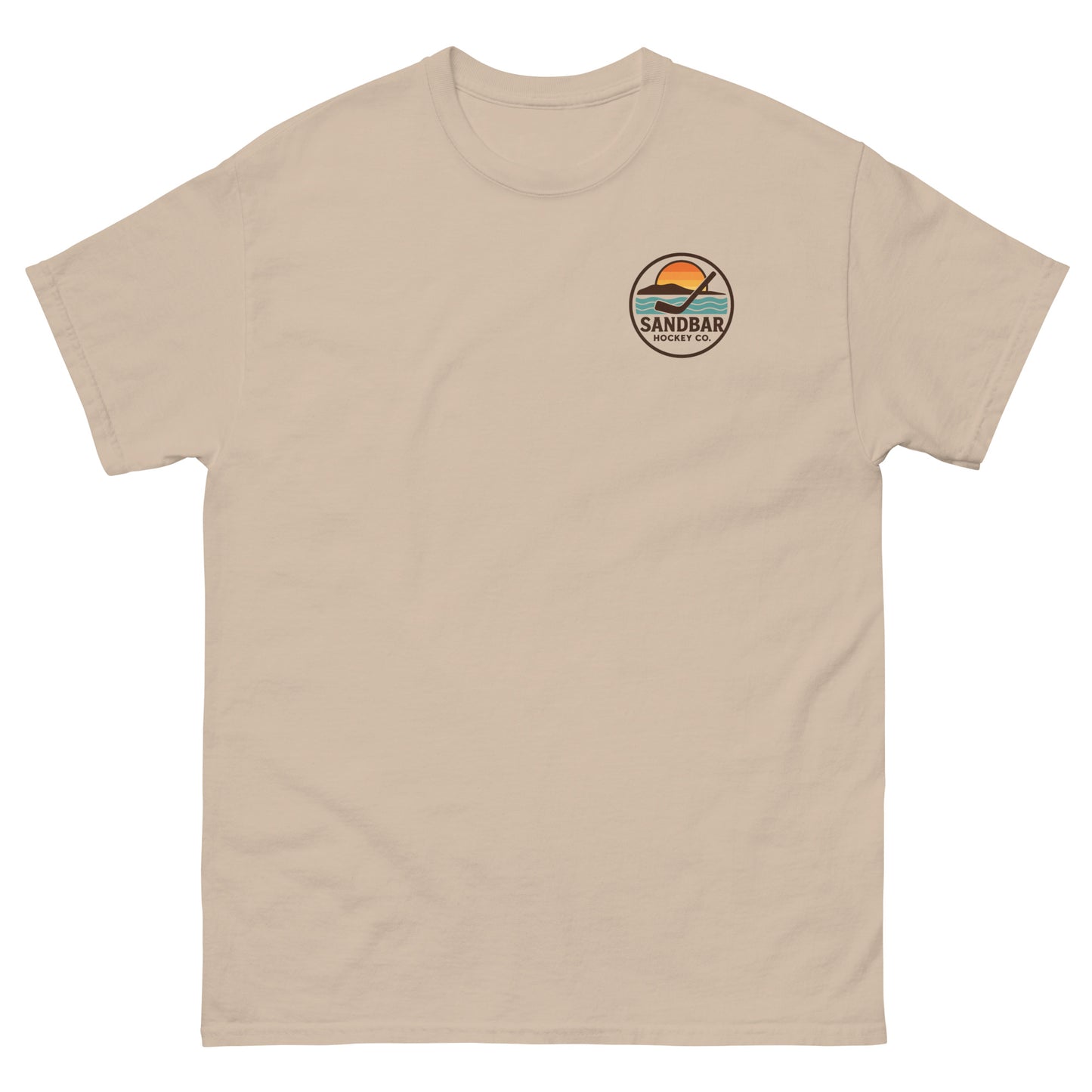 Sand-colored hockey t-shirt with small front chest logo featuring a circular Sandbar Hockey Co. sunset-and-stick emblem.