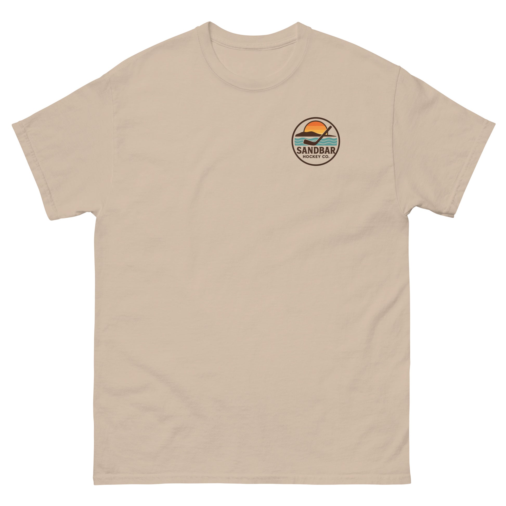 Sand-colored hockey t-shirt with small front chest logo featuring a circular Sandbar Hockey Co. sunset-and-stick emblem.