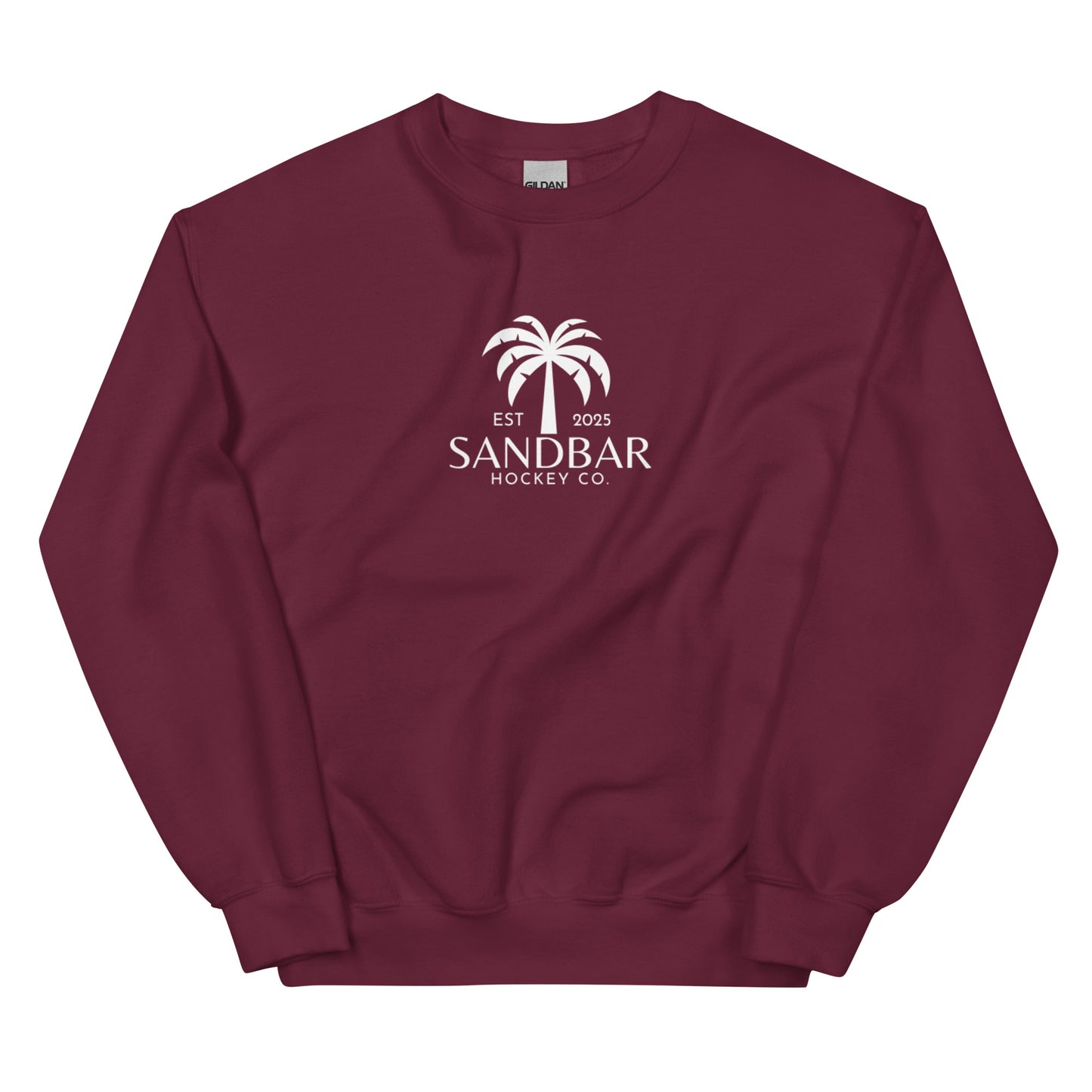 Maroon hockey crewneck sweatshirt front side with small palm tree Sandbar Hockey Co. chest logo