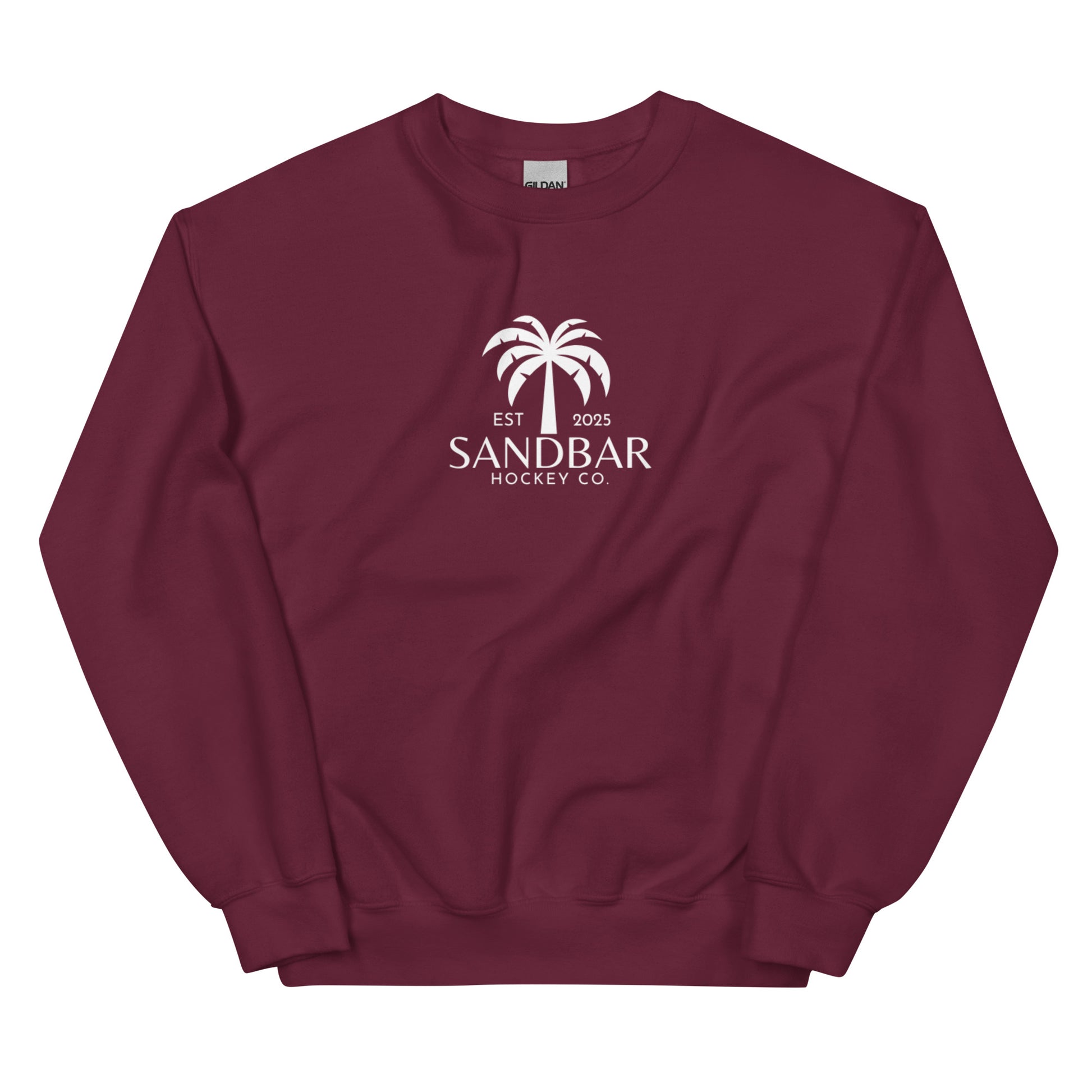 Maroon hockey crewneck sweatshirt front side with small palm tree Sandbar Hockey Co. chest logo