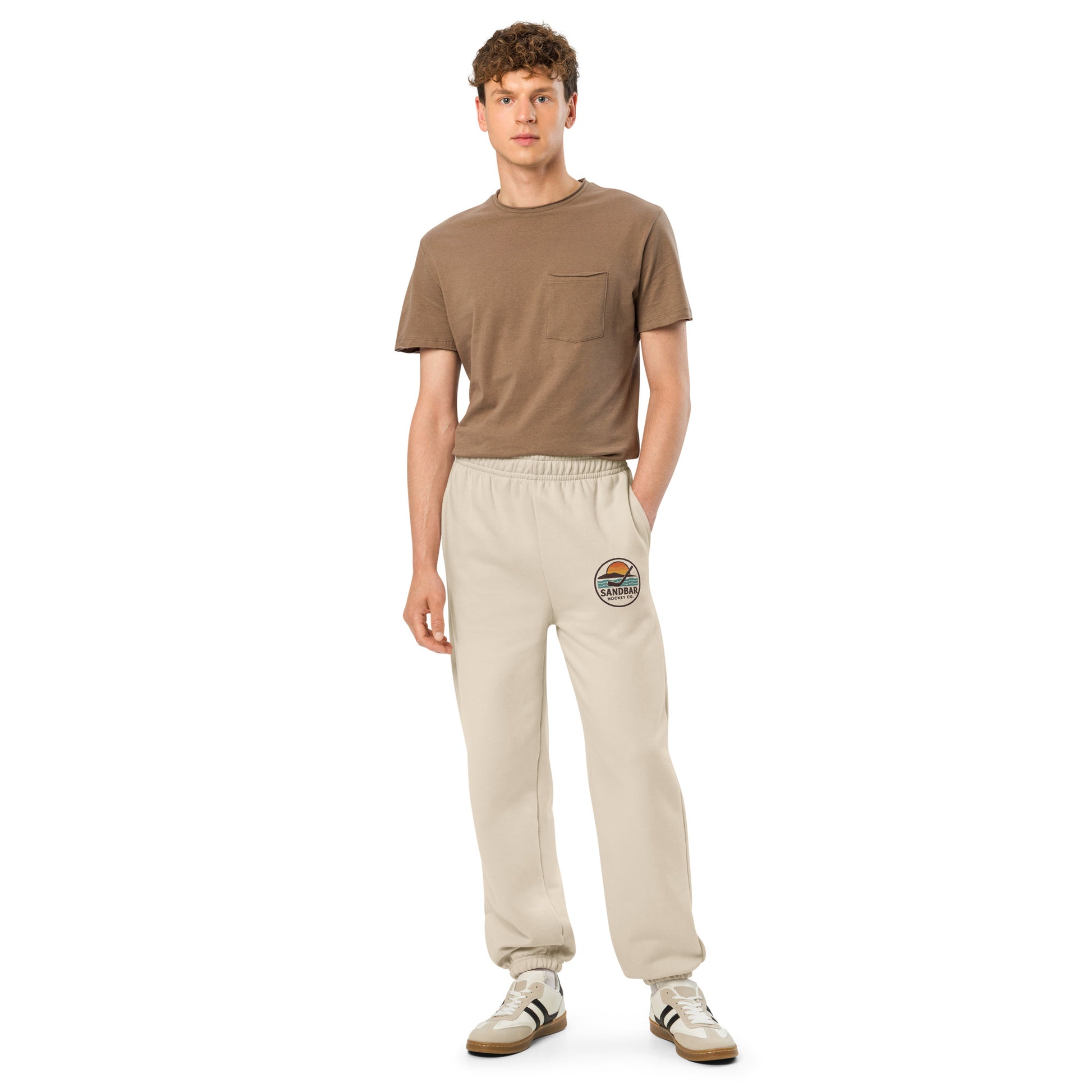 Sand hockey sweatpants full front view on model with side pockets