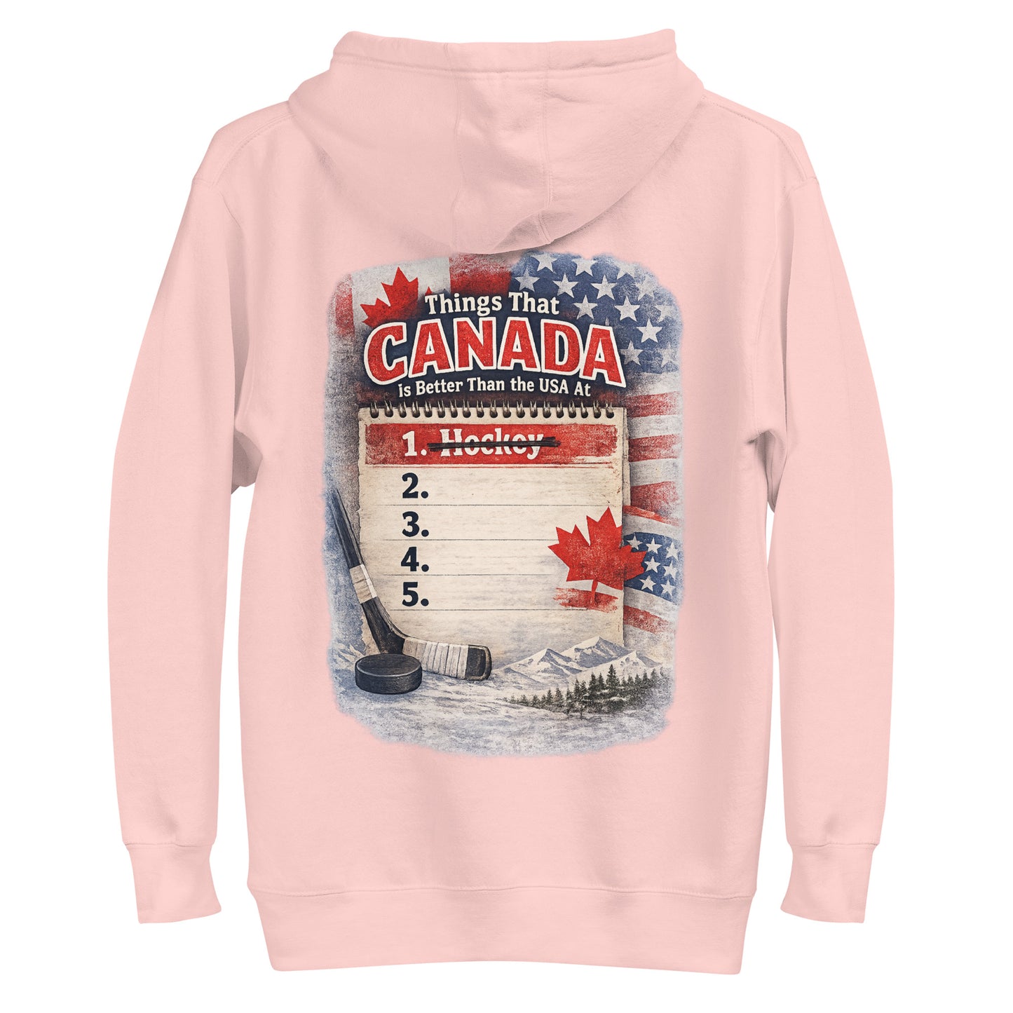 Light pink hockey hoodie with the large back graphic that says “Things That Canada Is Better Than the USA At,” featuring the vintage notepad list, crossed-out “1. Hockey,” flags, maple leaf, stick, puck, and mountain scene.