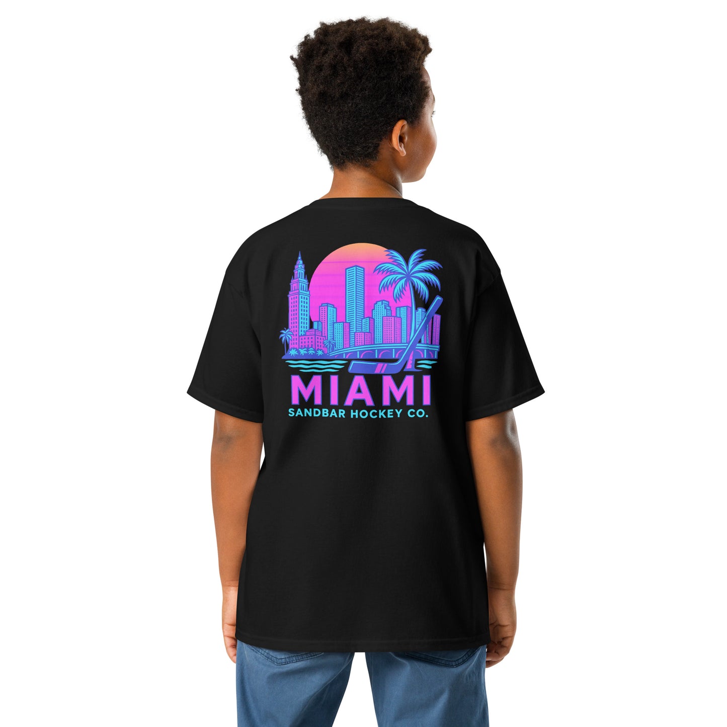 Youth black Miami Sandbar Hockey T-shirt back view with large neon Miami skyline graphic, palm trees, hockey stick, and Miami Sandbar Hockey Co. text