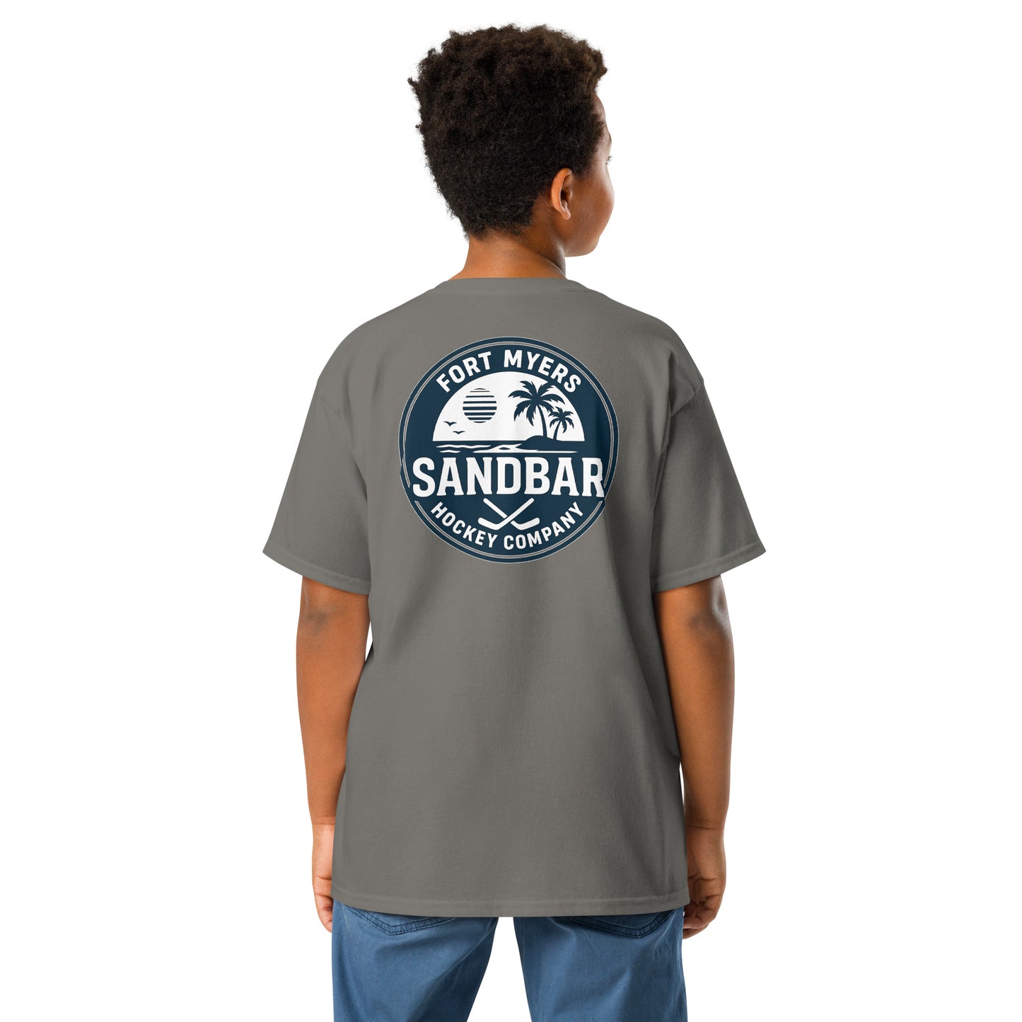 Dark gray Youth Fort Myers Sandbar Hockey T-shirt back view with large circular Fort Myers Sandbar Hockey Company graphic featuring palm trees, island, water, sunset, birds, and crossed hockey sticks