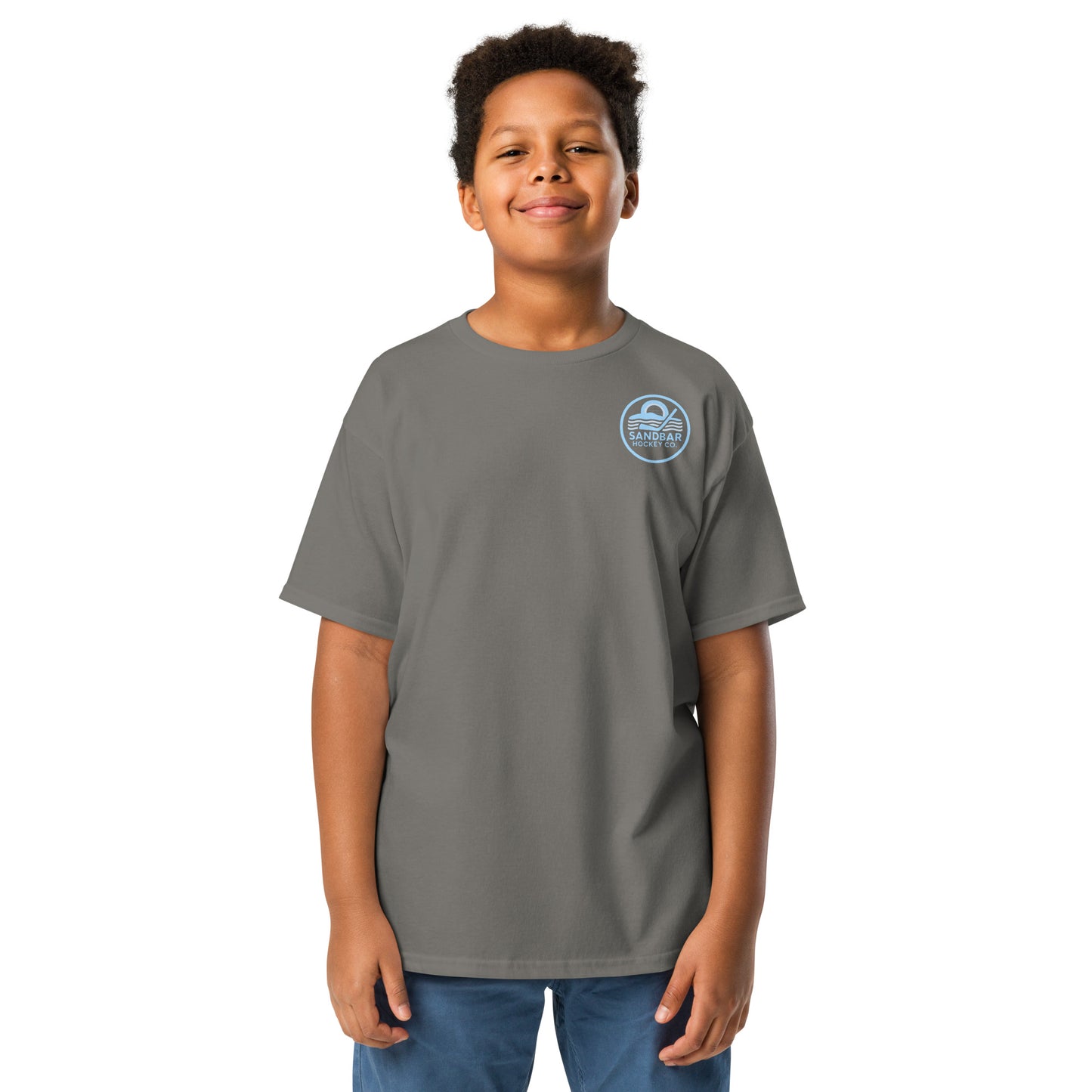 Youth charcoal roller hockey t-shirt front view worn by a boy with baby blue Sandbar Hockey Co. chest logo.