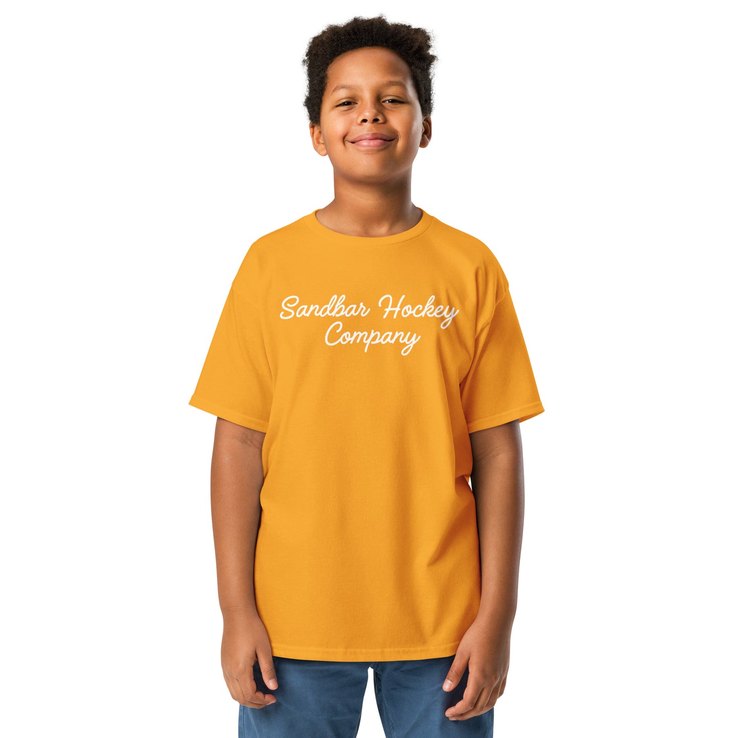 Gold youth T-shirt with “Sandbar Hockey Company” printed in white script across the front chest.