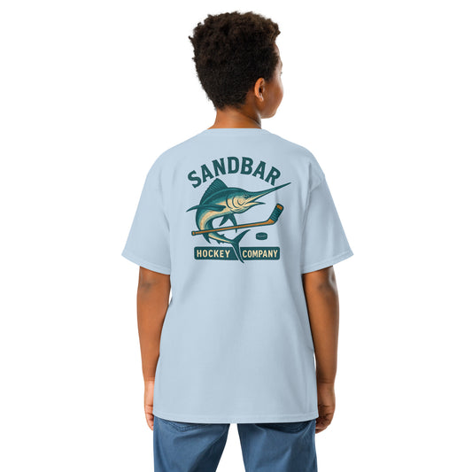 Light blue youth hockey t-shirt back side on model with marlin and hockey stick graphic and Sandbar Hockey Company text