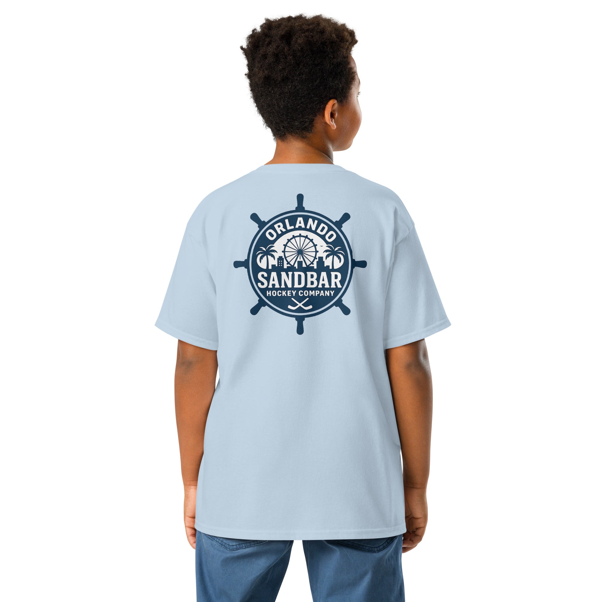 Light blue Orlando Sandbar Hockey youth t-shirt back view with large ship wheel style Orlando Sandbar Hockey Company graphic featuring palm trees, skyline, Ferris wheel, and crossed hockey sticks