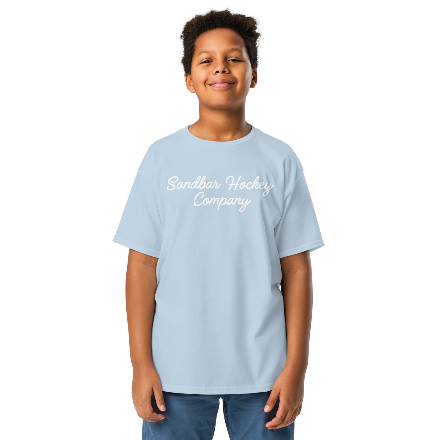 Light blue youth T-shirt with “Sandbar Hockey Company” printed in white script across the front chest.