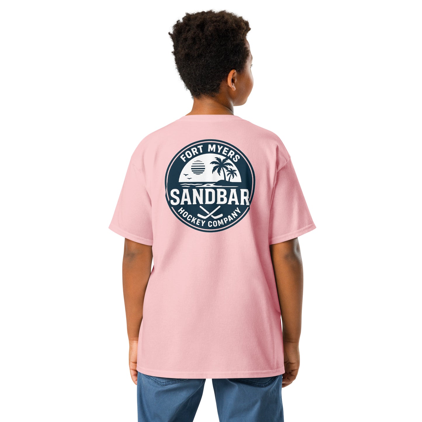 Light pink Youth Fort Myers Sandbar Hockey T-shirt back view with large circular Fort Myers Sandbar Hockey Company graphic featuring palm trees, island, water, sunset, birds, and crossed hockey sticks