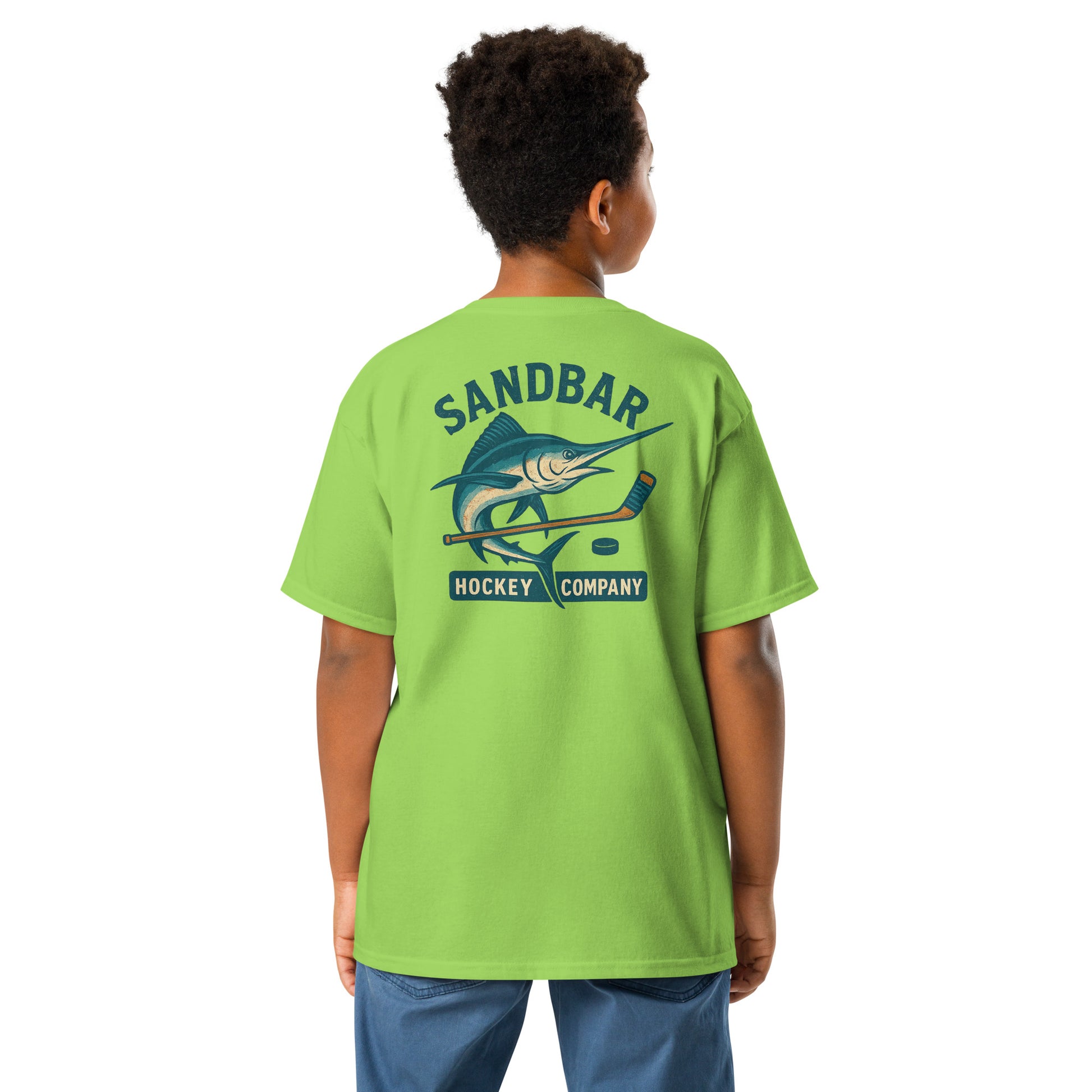 Lime green youth hockey t-shirt back side on model with marlin and hockey stick graphic and Sandbar Hockey Company text