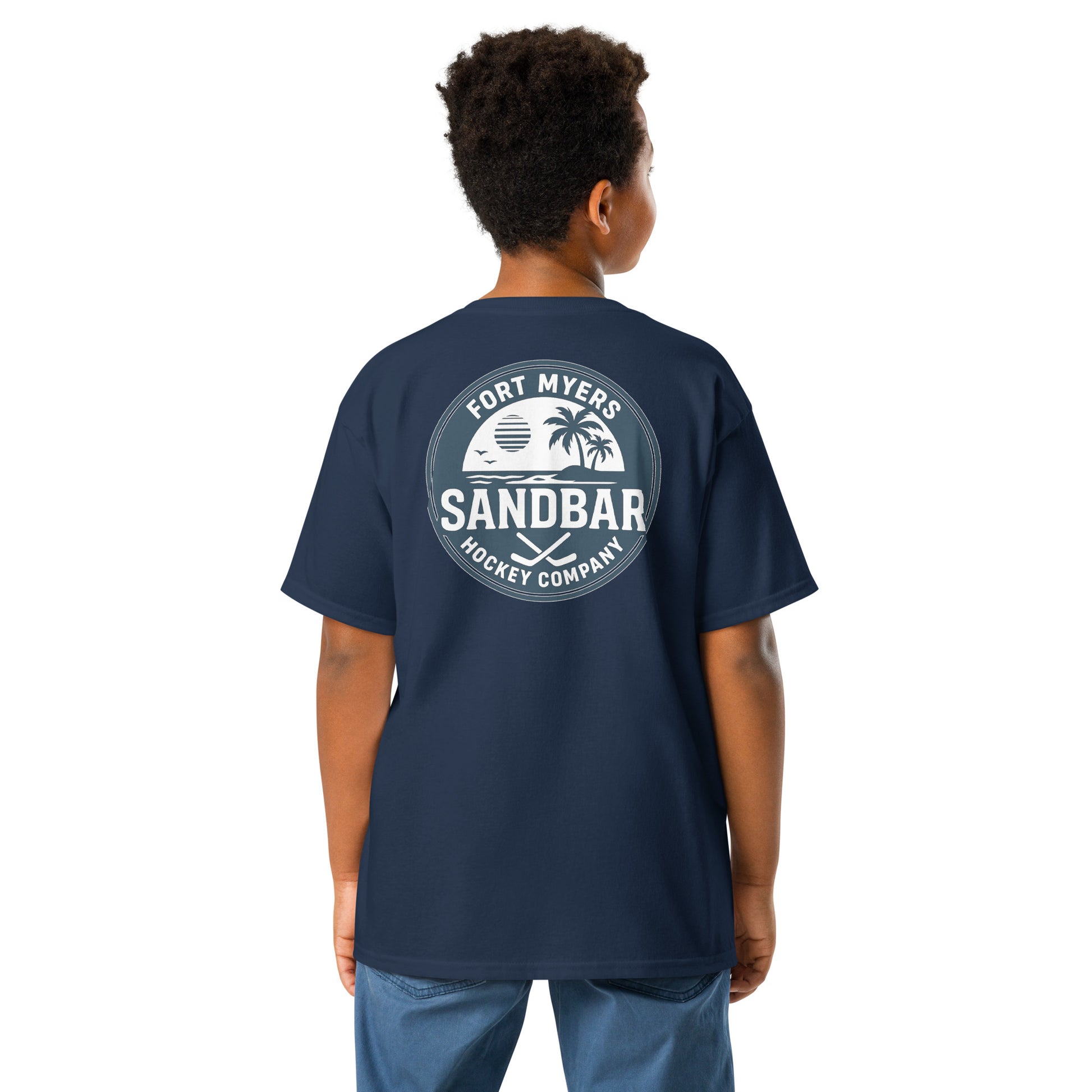 Navy Youth Fort Myers Sandbar Hockey T-shirt back view with large circular Fort Myers Sandbar Hockey Company graphic featuring palm trees, island, water, sunset, birds, and crossed hockey sticks