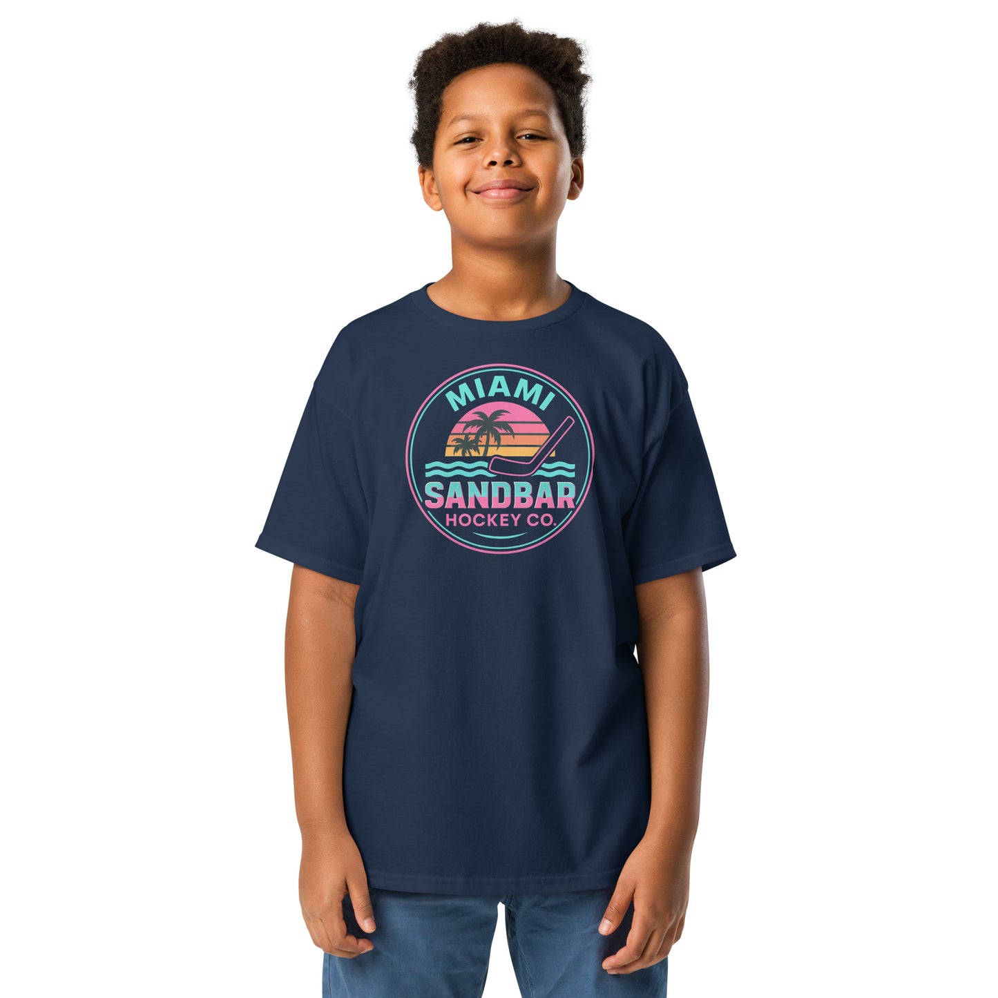Youth Navy Blue Miami Sandbar Hockey T-shirt front view with circular Miami Sandbar Hockey Co. graphic featuring palm trees, sunset stripes, ocean waves, and a hockey stick