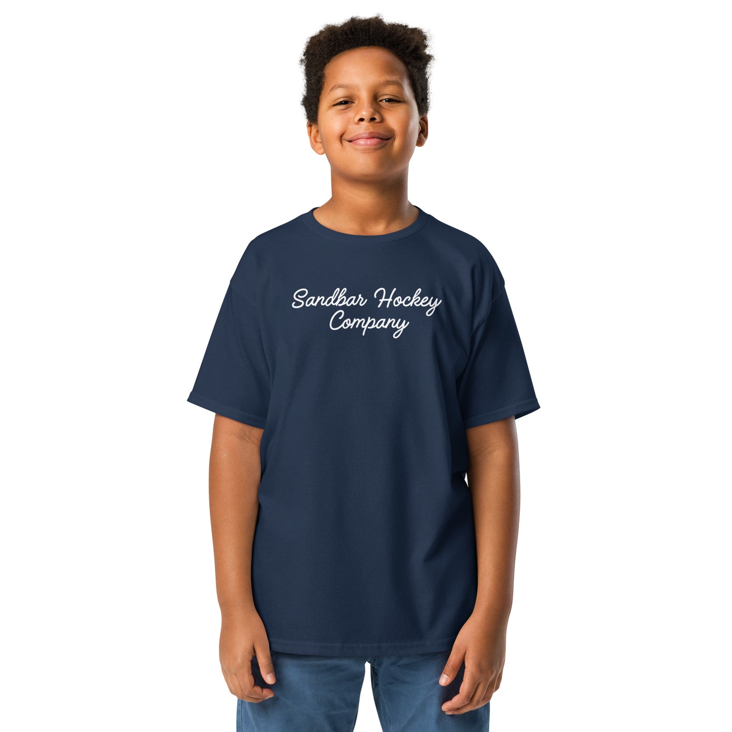 Youth navy southern roller hockey t-shirt front view worn by a boy with Sandbar Hockey Company script on the chest.
