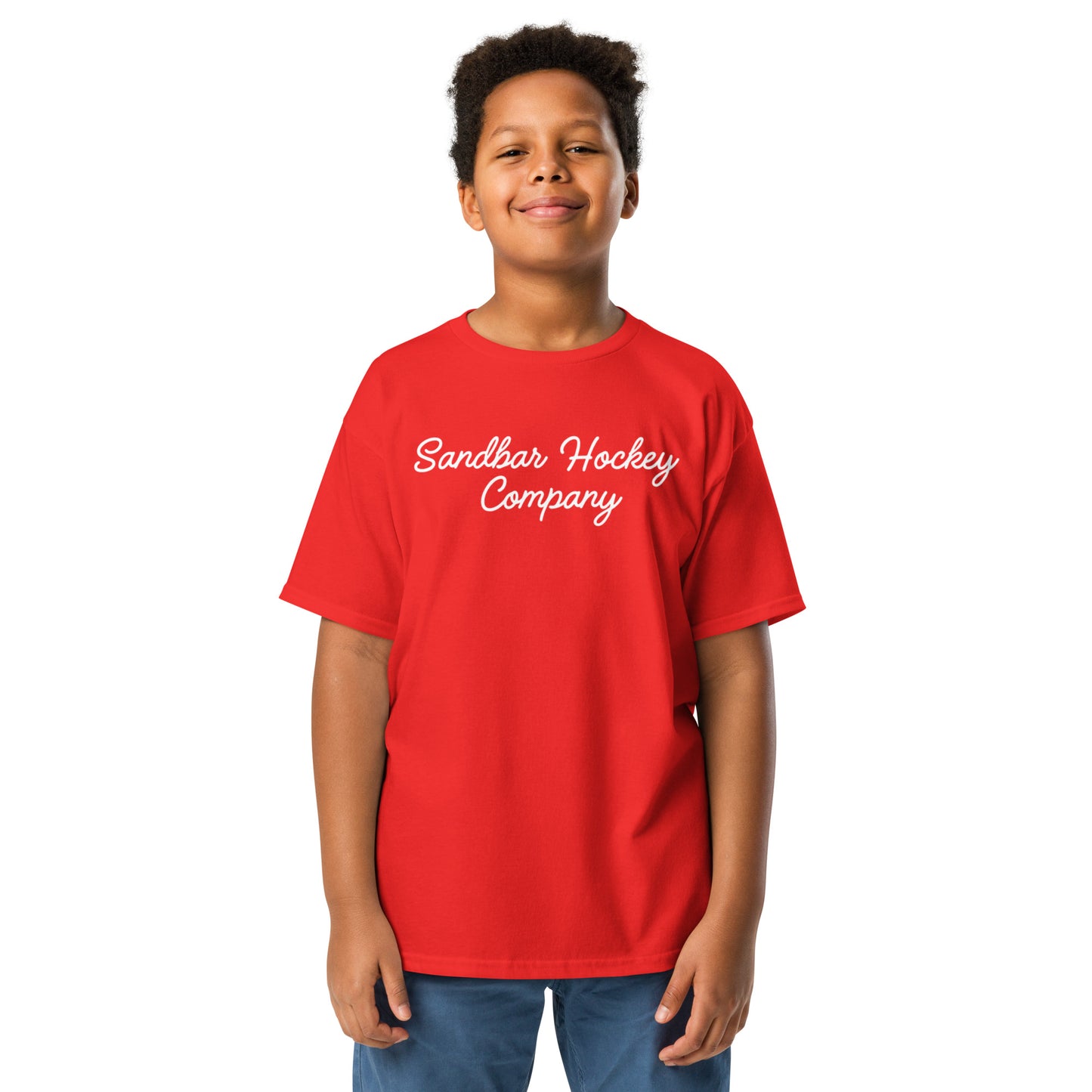 Red youth T-shirt with “Sandbar Hockey Company” printed in white script across the front chest.