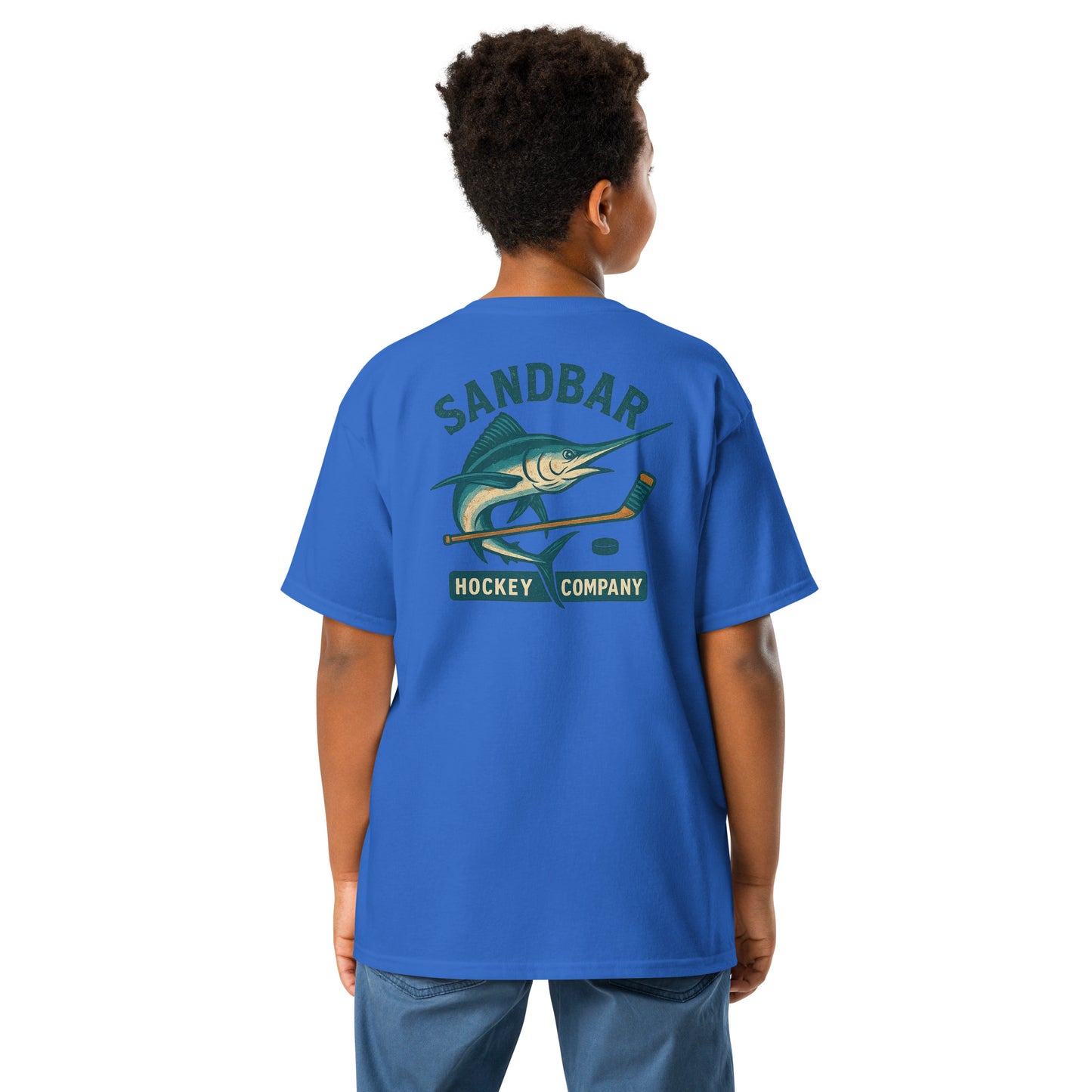 Blue youth hockey t-shirt back side on model with marlin and hockey stick graphic and Sandbar Hockey Company text
