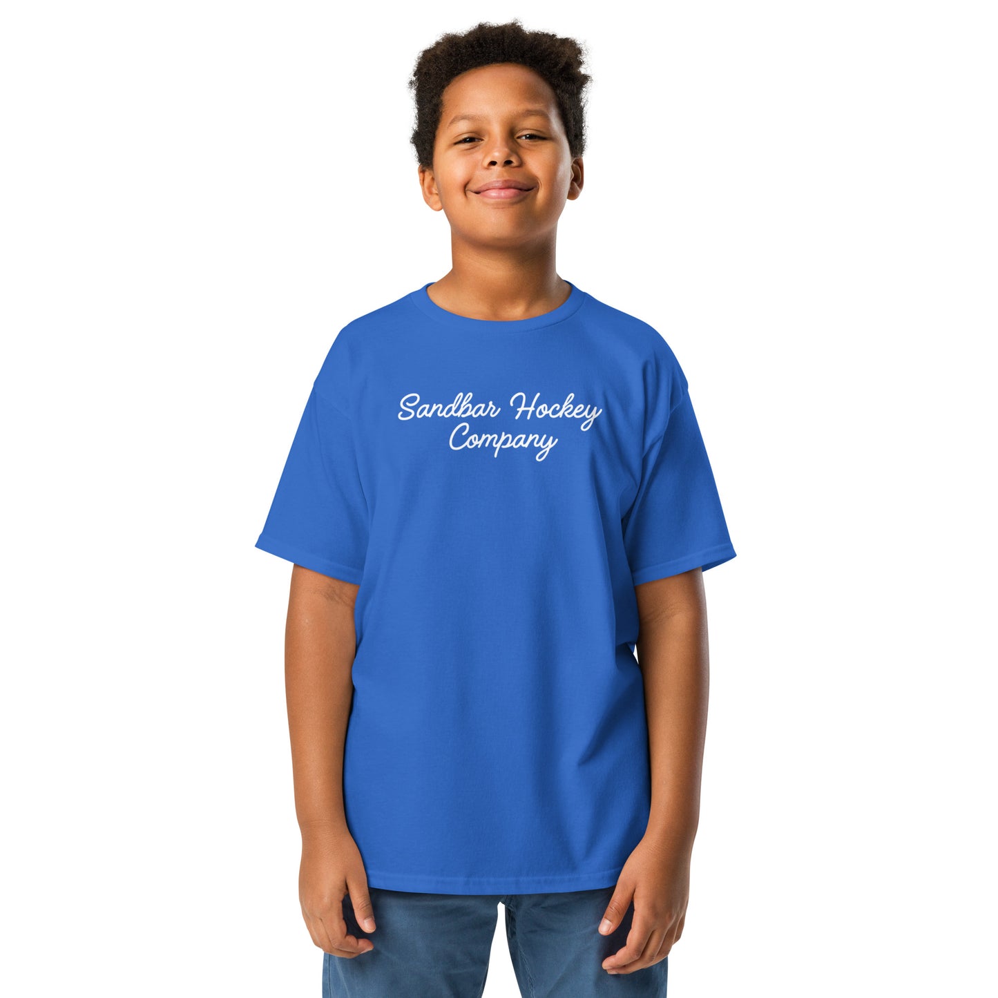 Youth royal blue southern roller hockey t-shirt front view worn by a boy with Sandbar Hockey Company script on the chest.