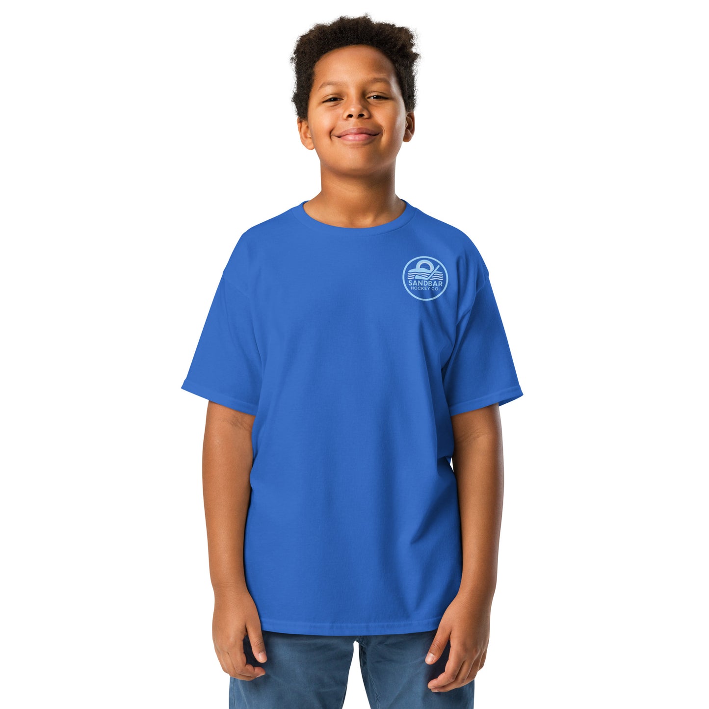Youth royal blue roller hockey t-shirt front view worn by a boy with baby blue Sandbar Hockey Co. chest logo.