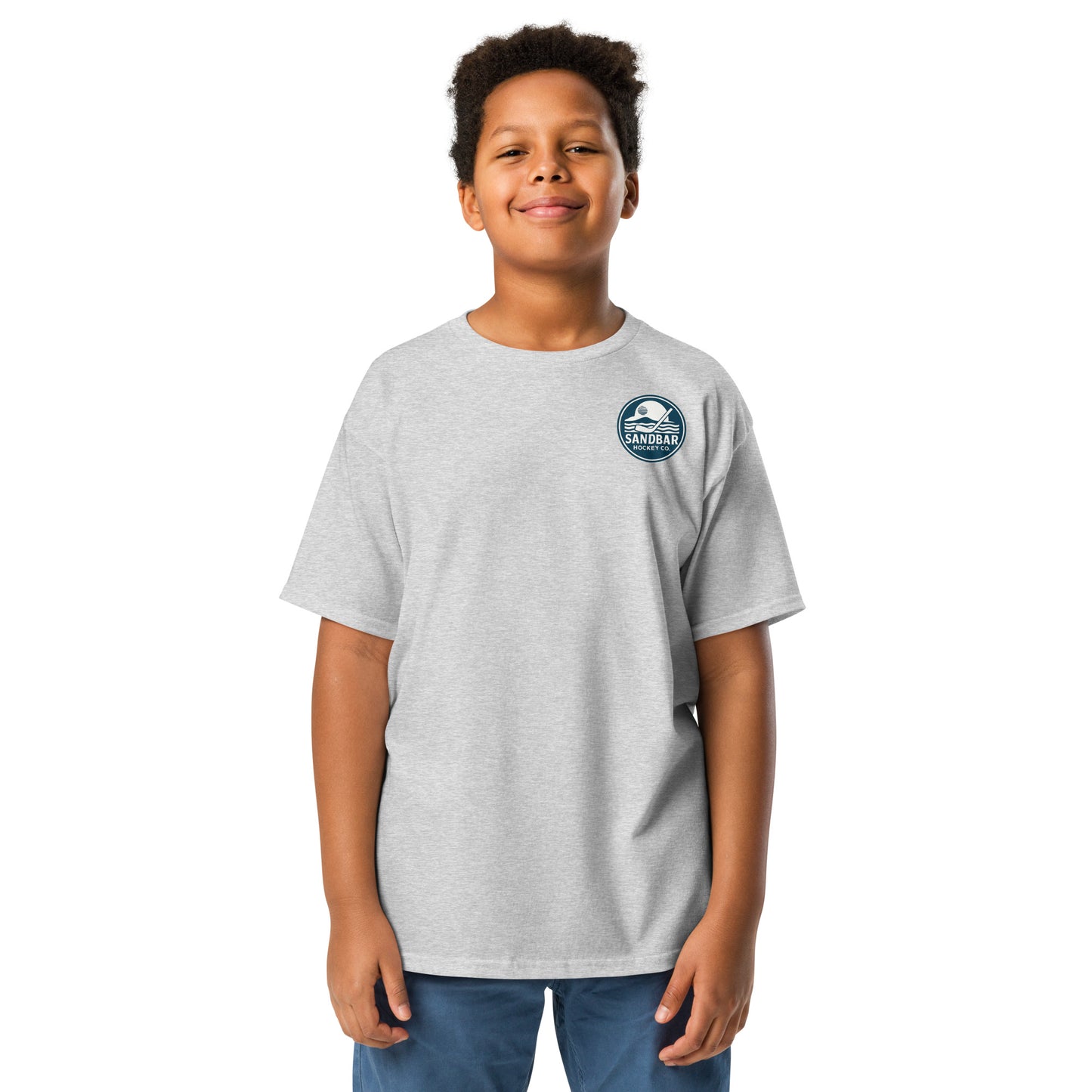 Grey Orlando Sandbar Hockey youth t-shirt front view with small circular Sandbar Hockey Co. sunset and hockey stick logo on left chest